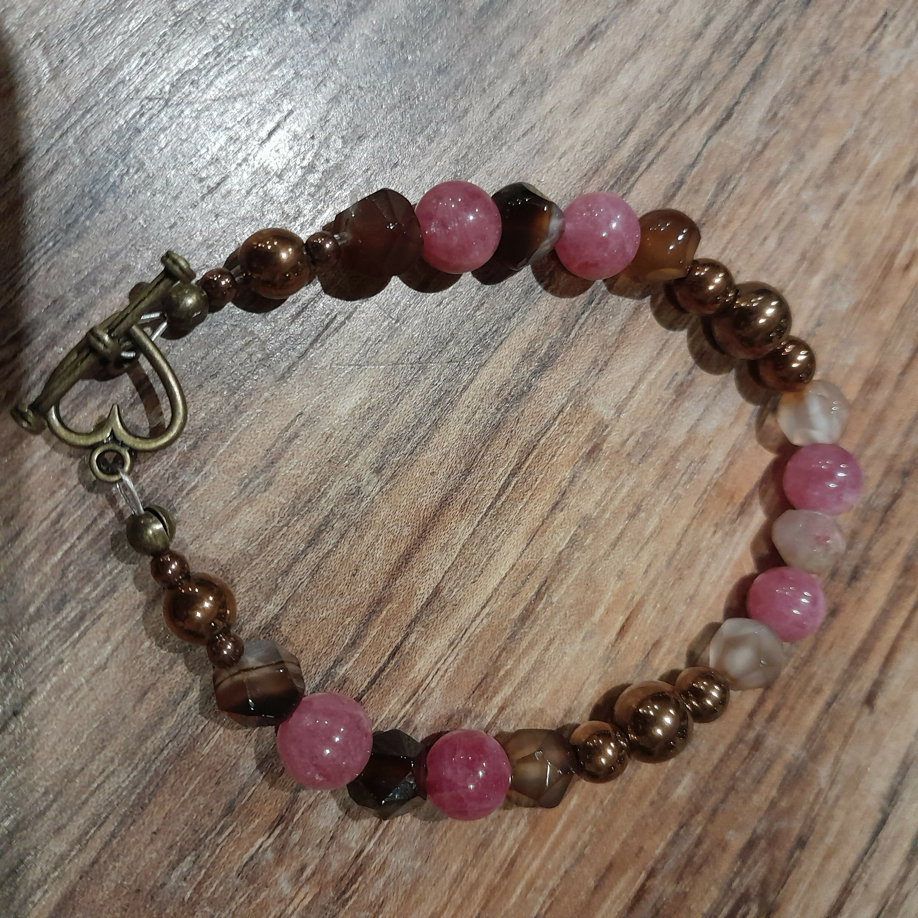 Bronze Toggle Catch Bracelet with Copper Hematite, Faceted Gulf Agate and Strawberry Quartz.