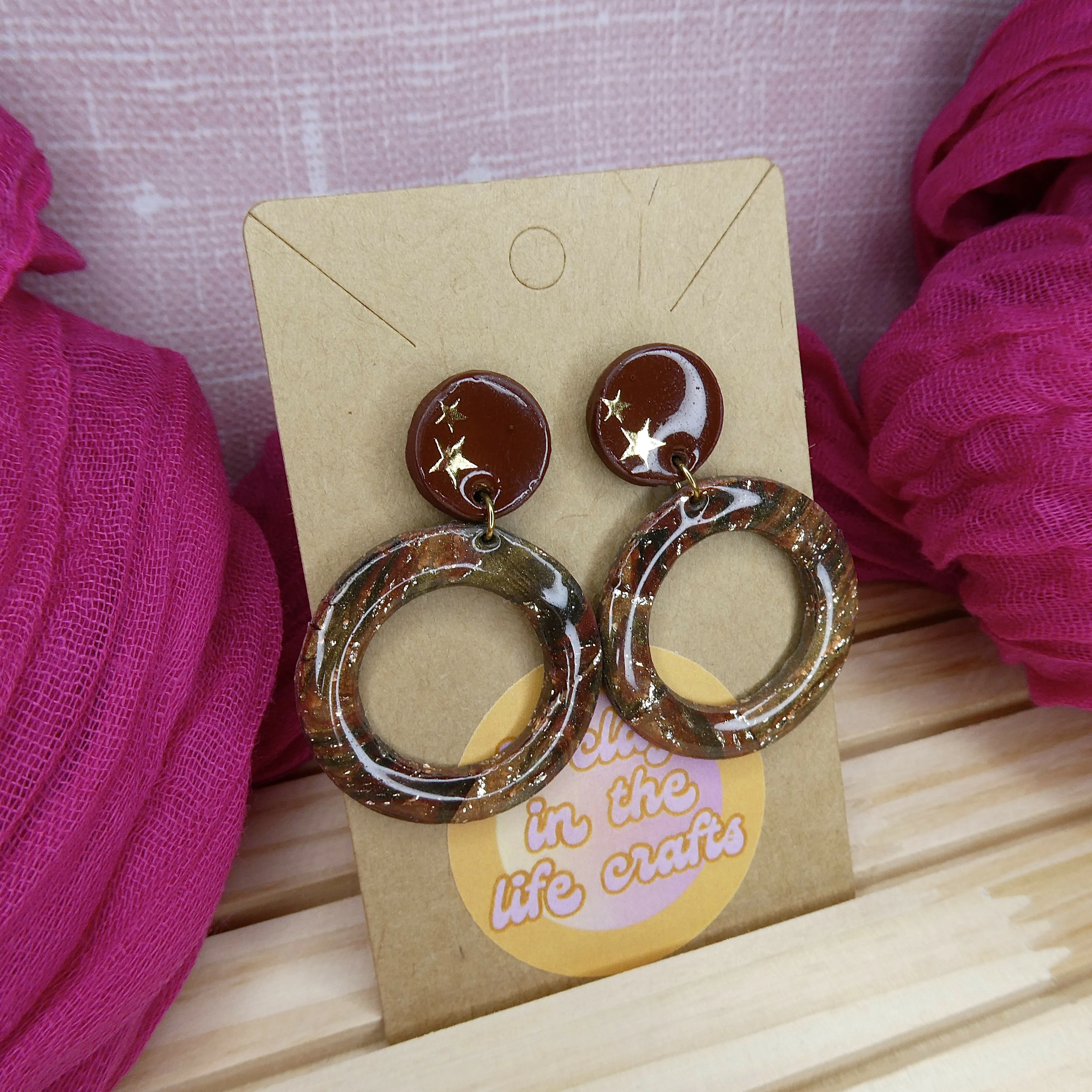 Brown Shimmery Earrings With Gold Star Detail