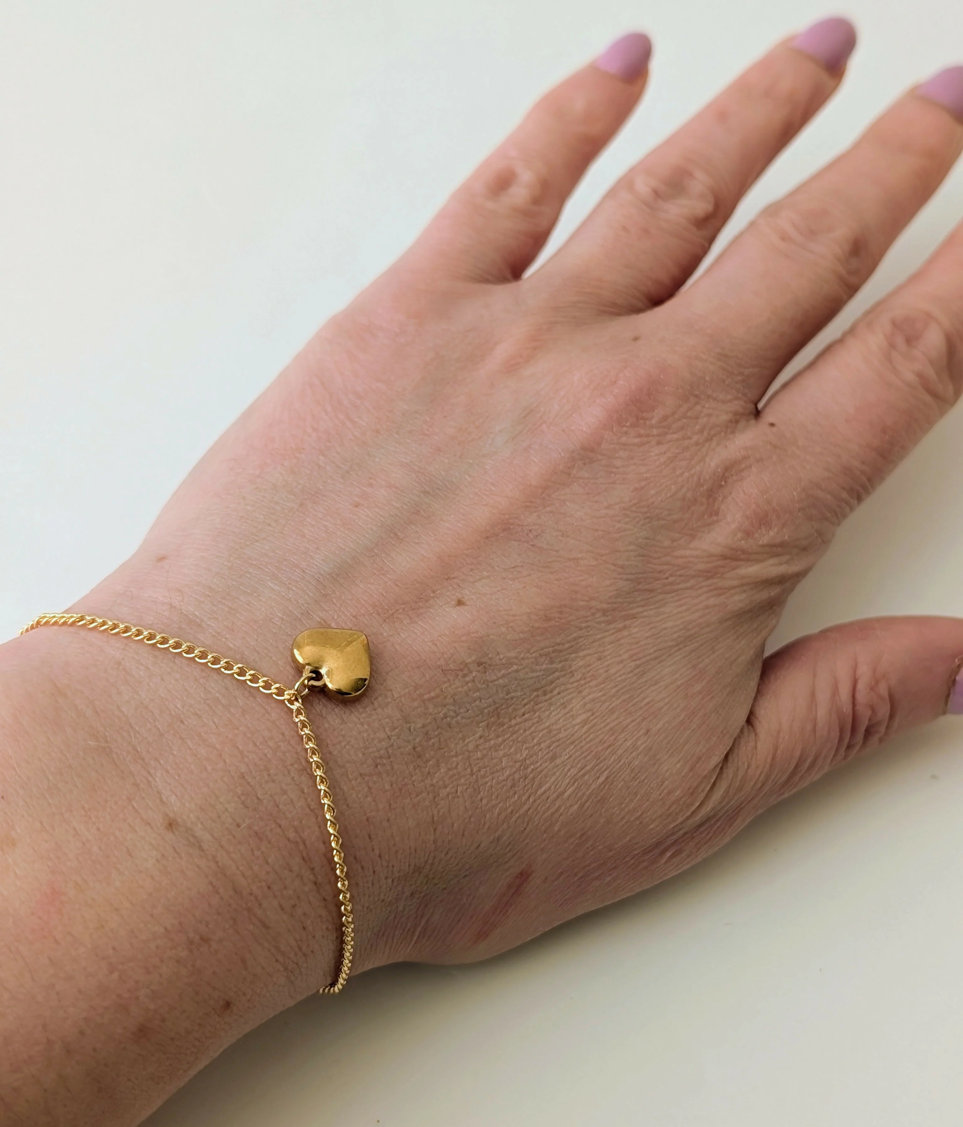 Chunky Gold 3D Heart Charm Bracelet on a Flat Gold Plated Chain - Image 2