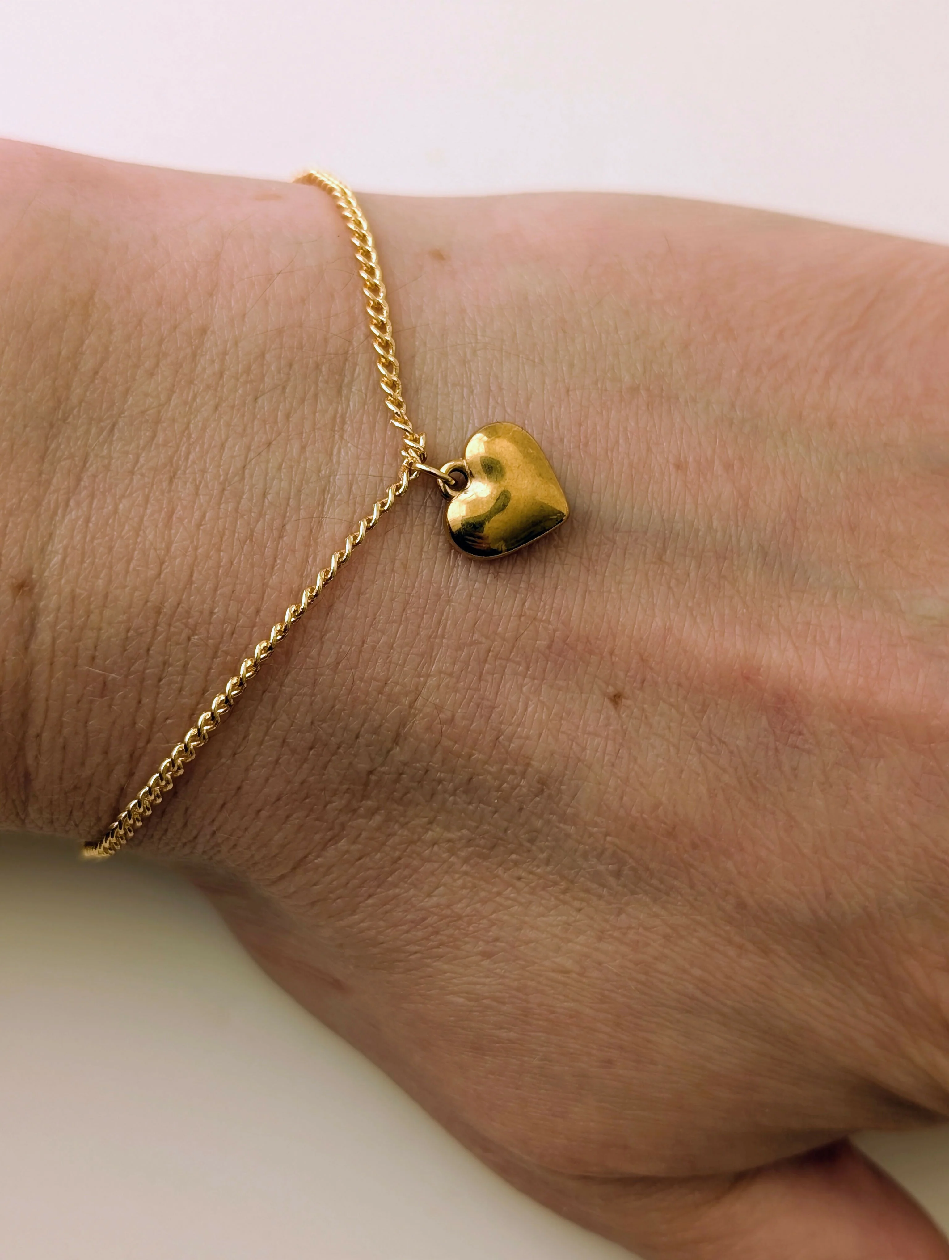 Chunky Gold 3D Heart Charm Bracelet on a Flat Gold Plated Chain - Image 3