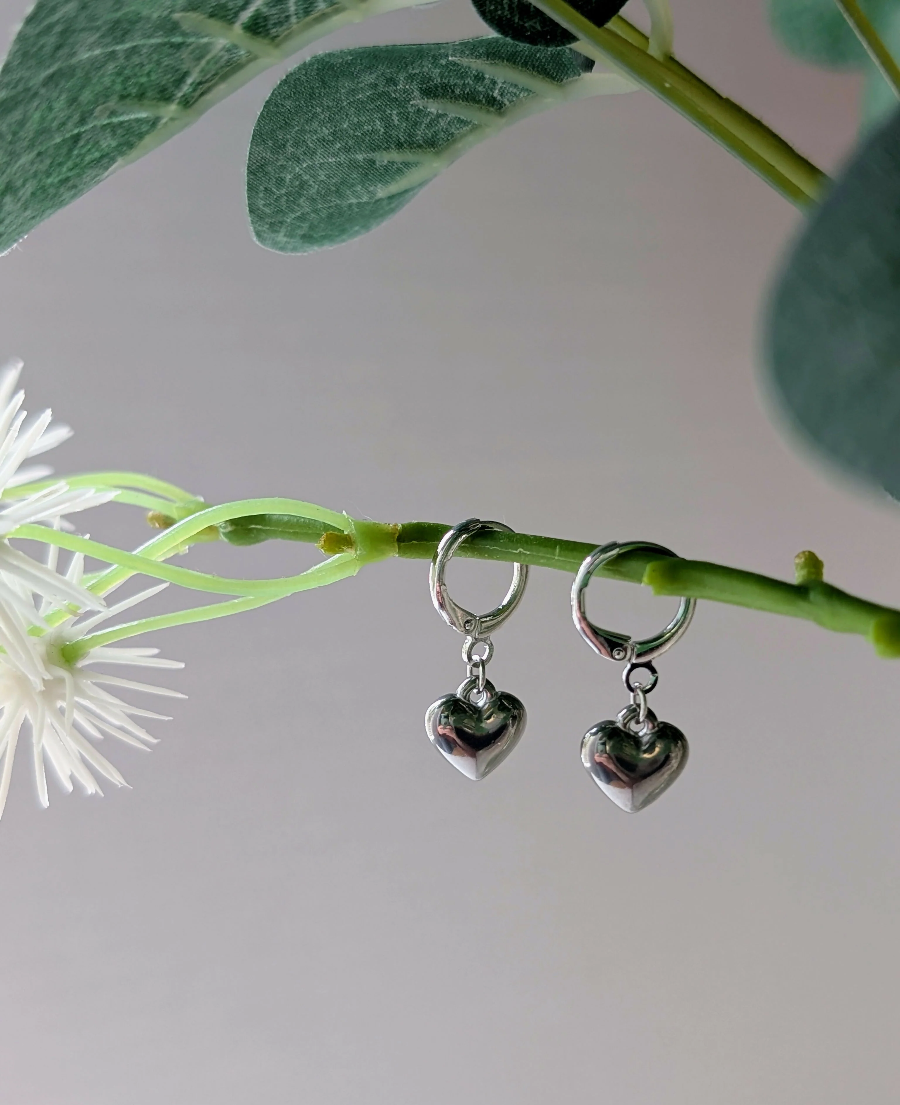 Chunky Silver 3D Heart Charm Huggie Earrings - Image 2