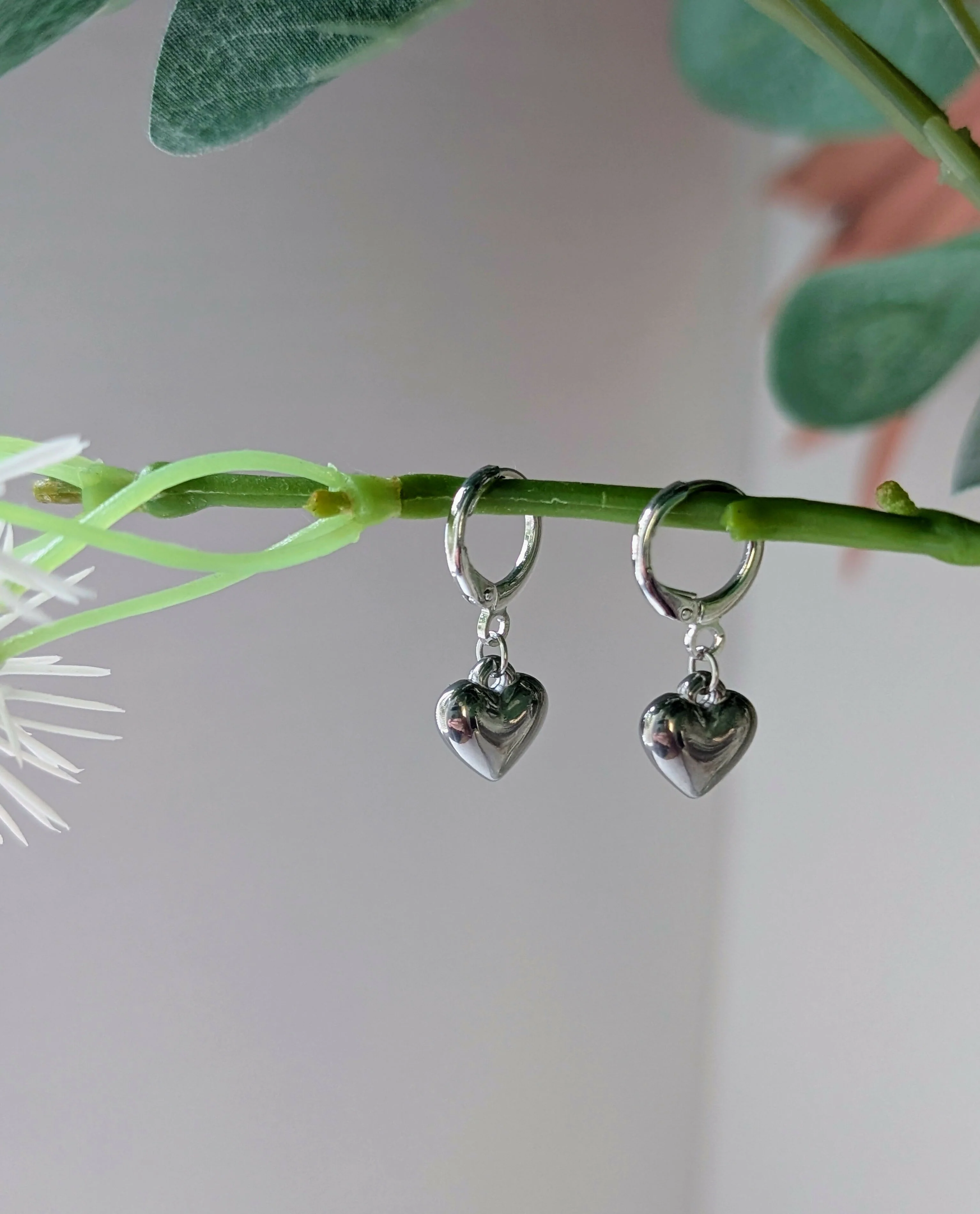 Chunky Silver 3D Heart Charm Huggie Earrings - Image 3