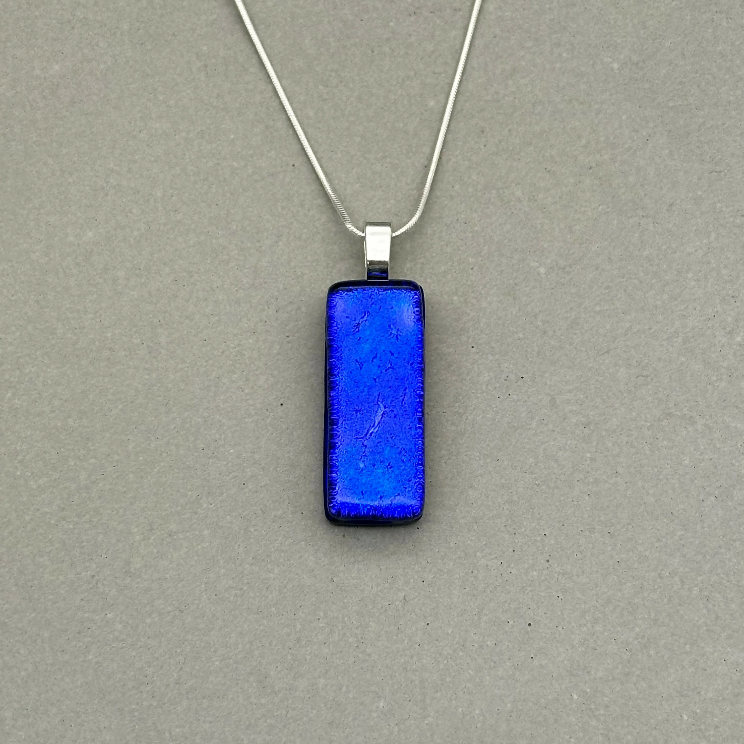 Cobalt Blue Dichroic Fused Glass Pendant with Silver Plated Chain - Handmade by Jade Tapson Glass.