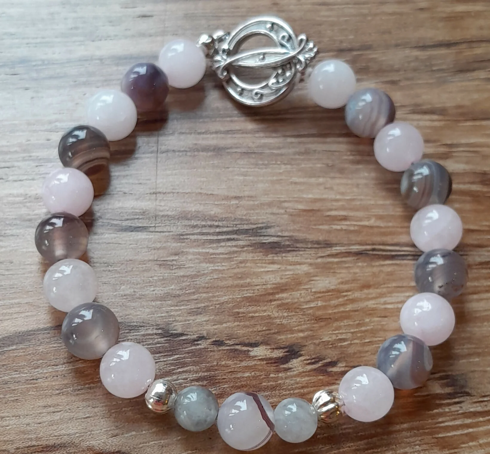 Gemstone Bracelet with a Tibetan Silver Toggle Catch, Rose Quartz, Banded Persian Agate and Tibetan Silver Spacer Beads.