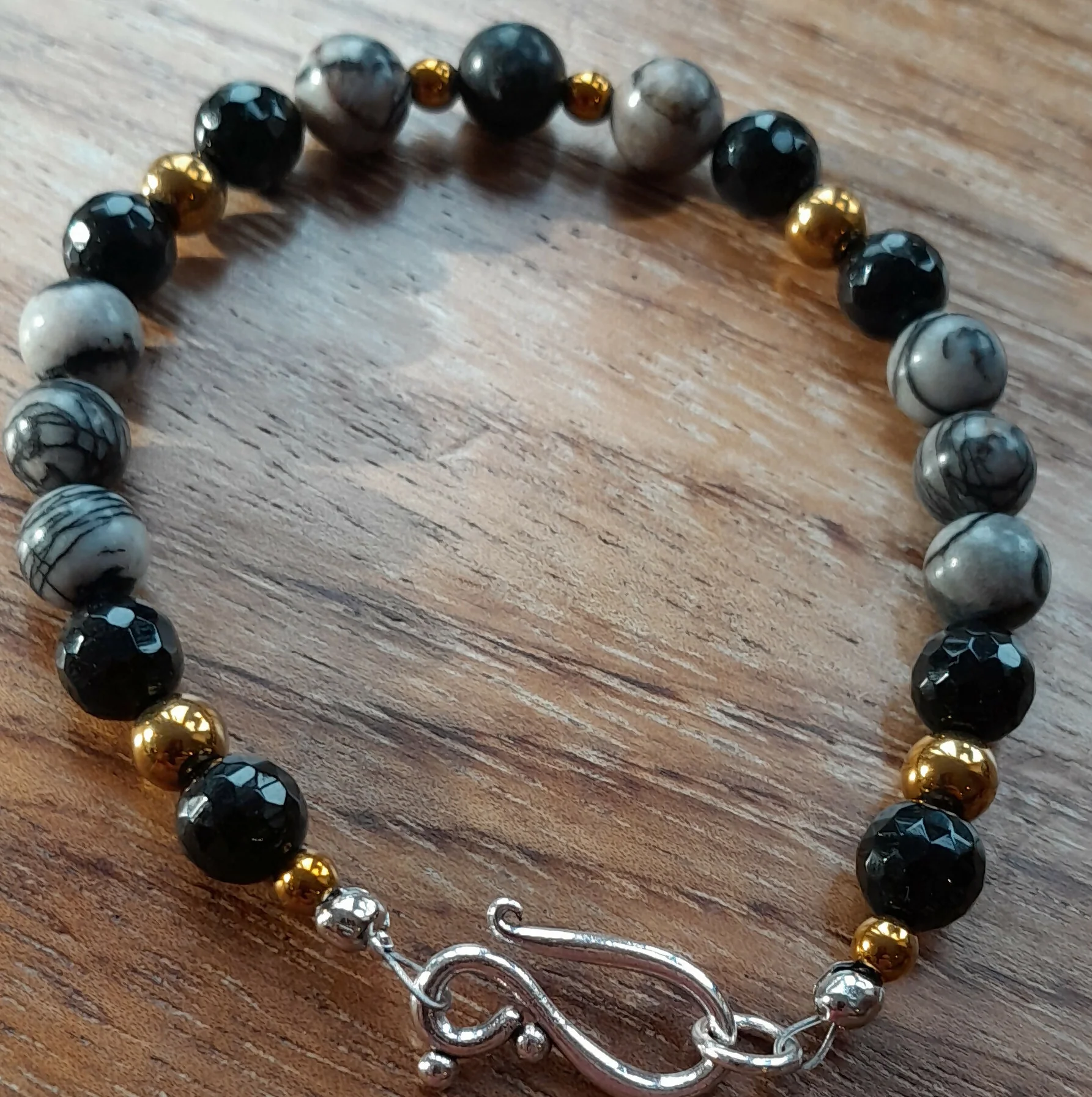 Gemstone Bracelet with Tibetan Silver Toggle Catch, Bronze Hematite, Faceted Onyx and Black Silkstone.