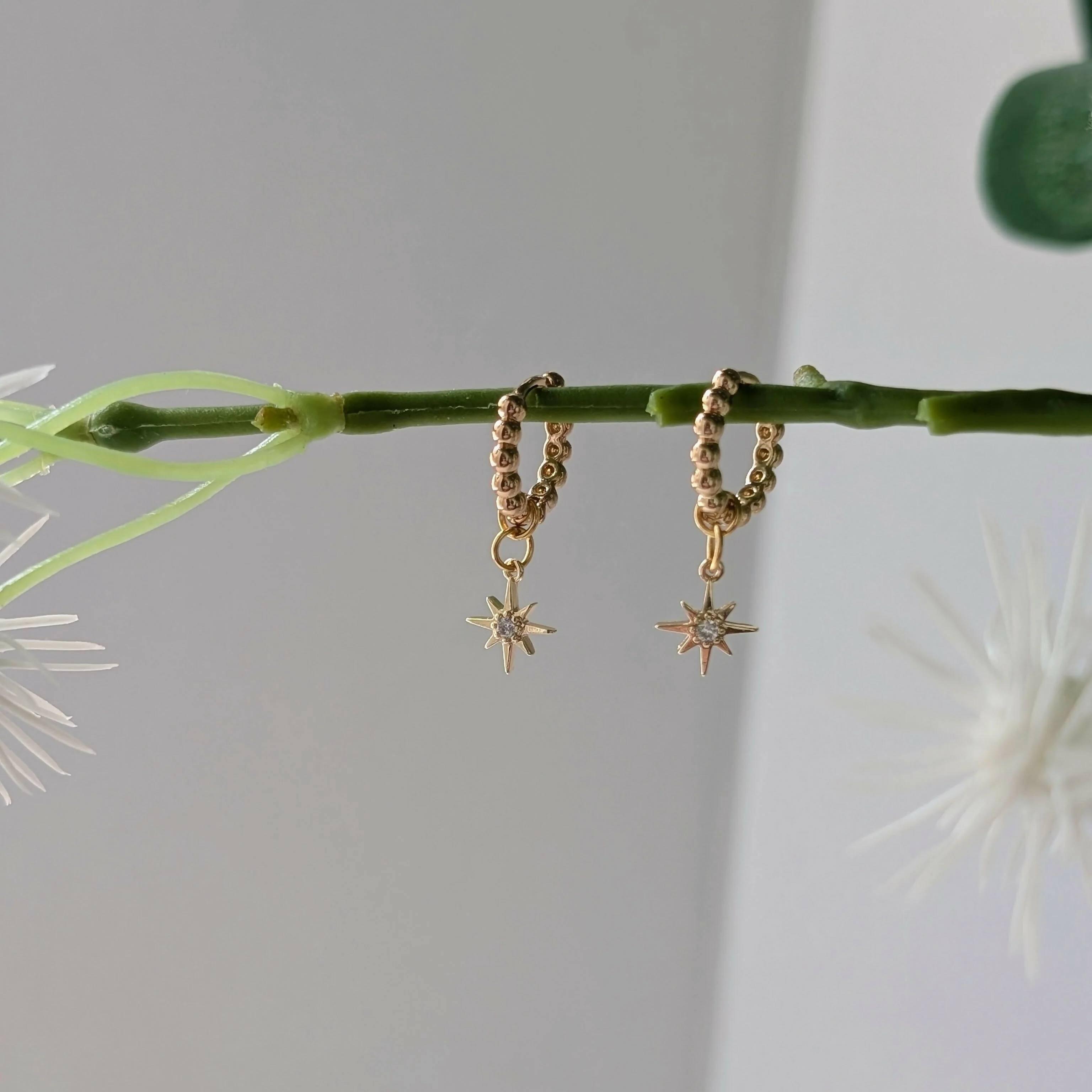 Gold Plated Bead Huggie Earrings with a Tiny Gold Cubic Zirconia Star Charm - Image 2