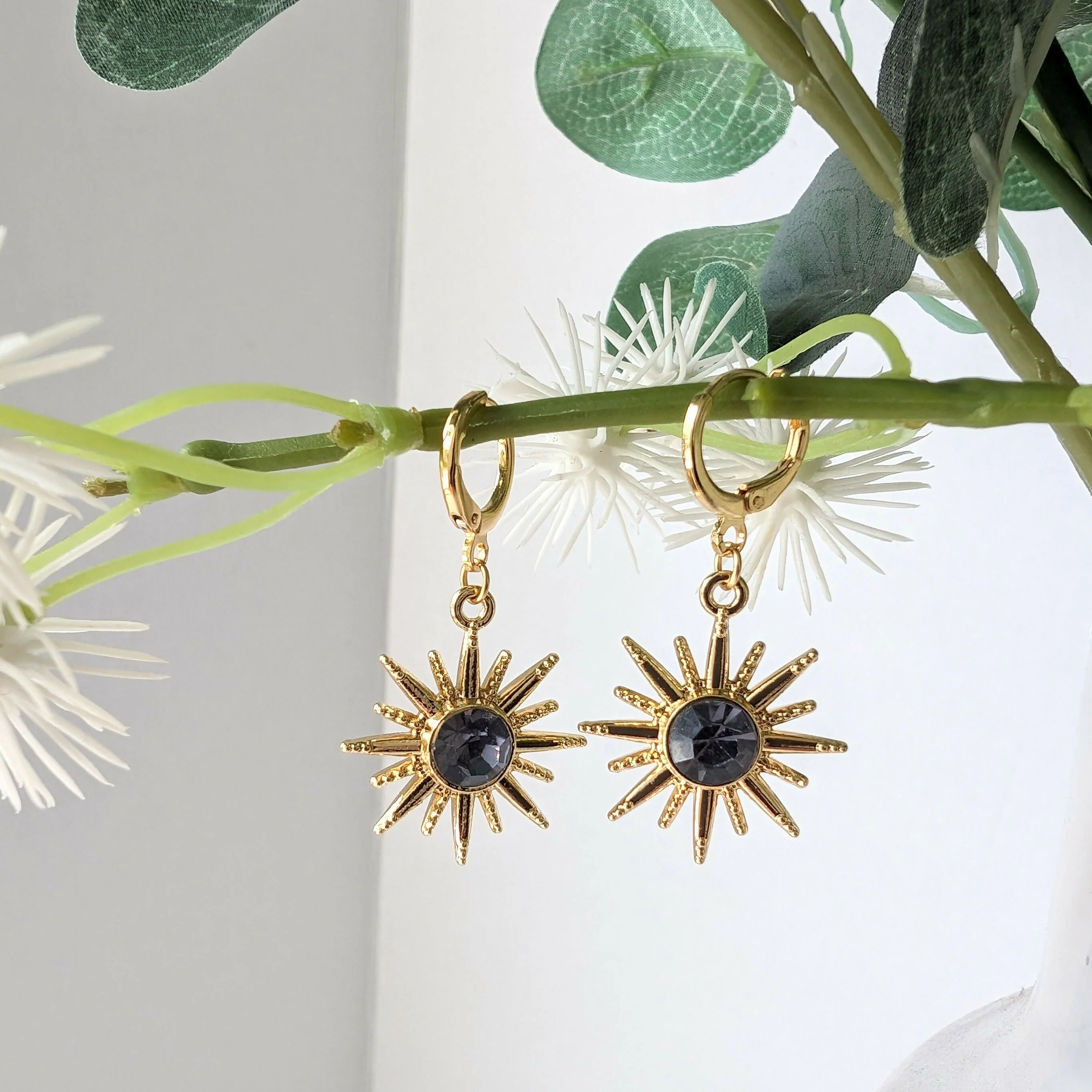 Gold Starburst Earrings with Deep Purple Glass Stone on Gold Plated Huggie