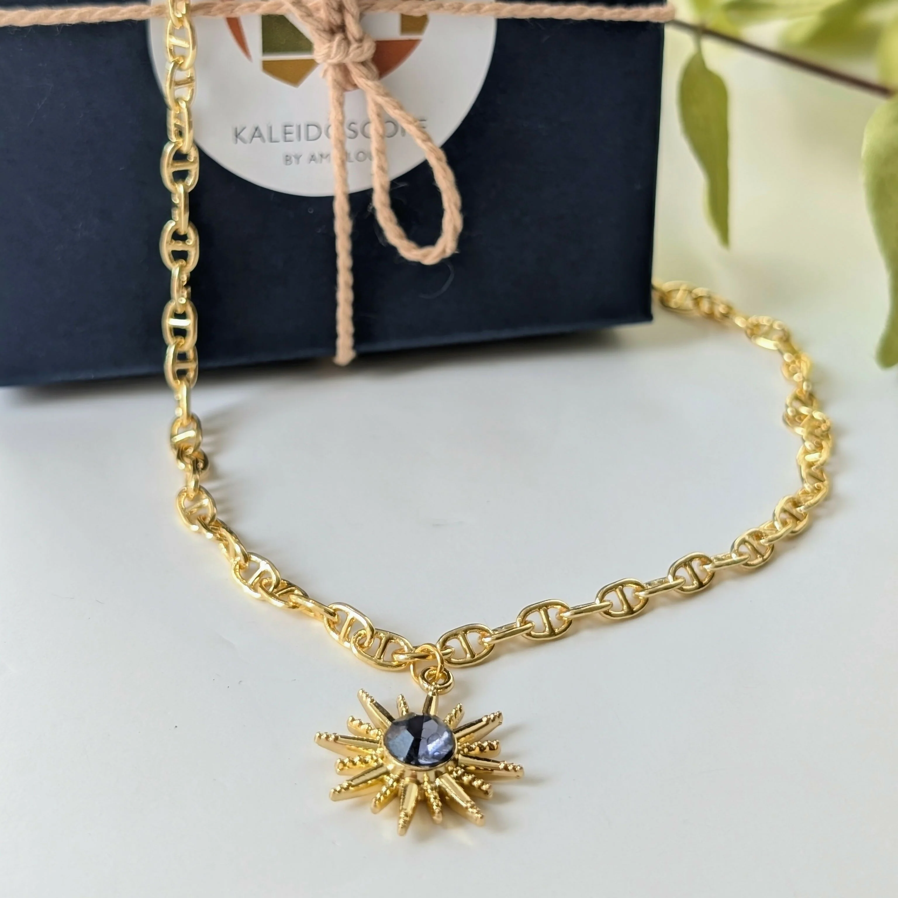Gold Starburst Necklace with Deep Purple Stone on Gold Plated Deco Oval Chain - Image 2