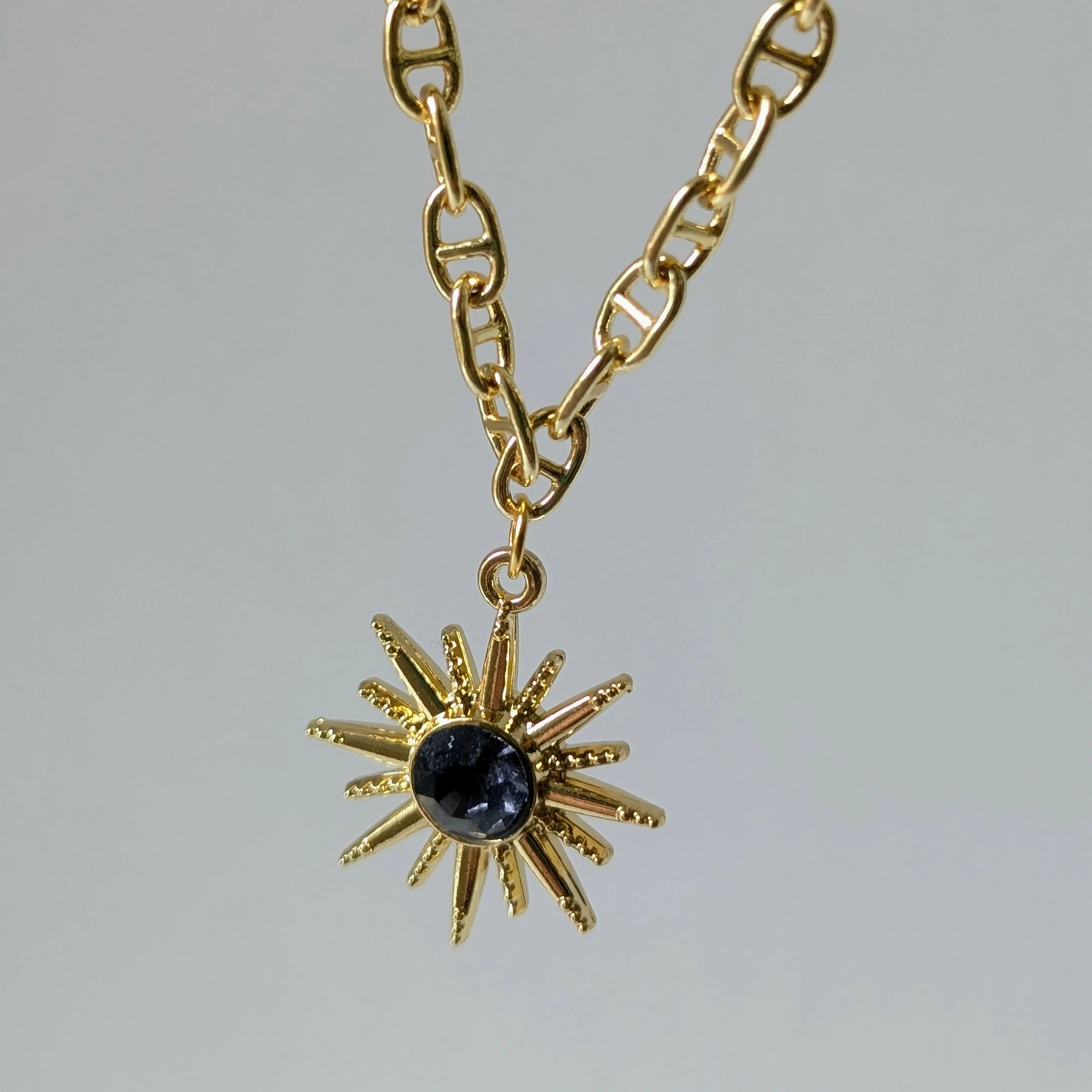 Gold Starburst Necklace with Deep Purple Stone on Gold Plated Deco Oval Chain - Image 3
