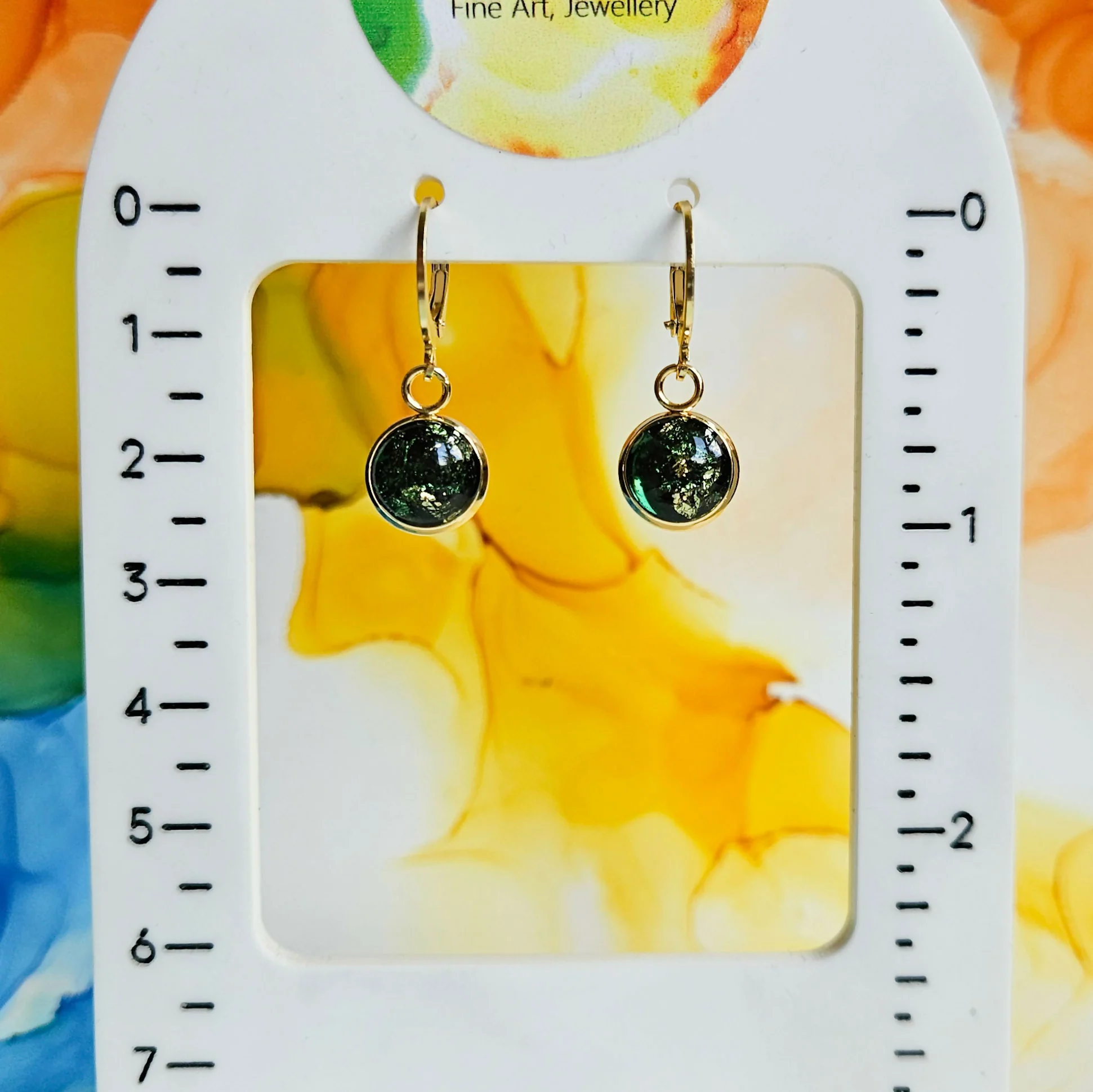 Handmade Dark Green And Gold Leaf Resin Charms On Huggie Hoops - Image 2