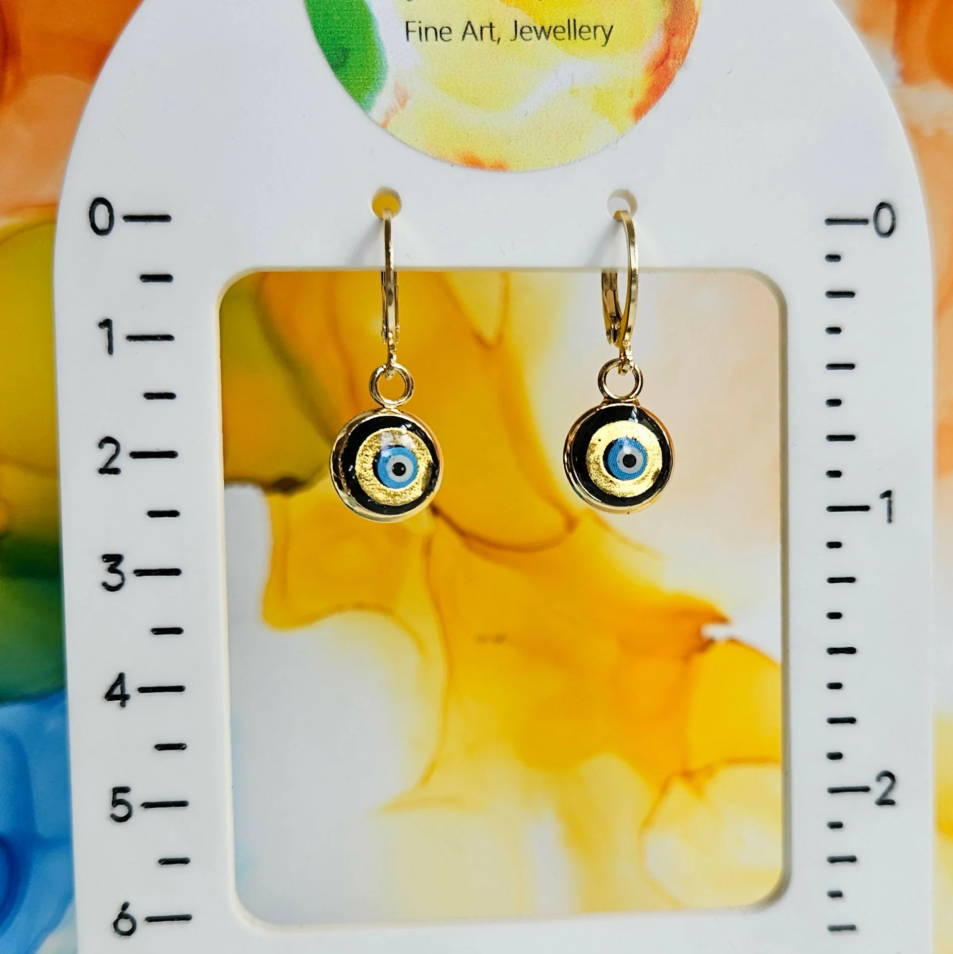 Handmade Evil Eye Resin Charms On Huggie Hoops - Image 2