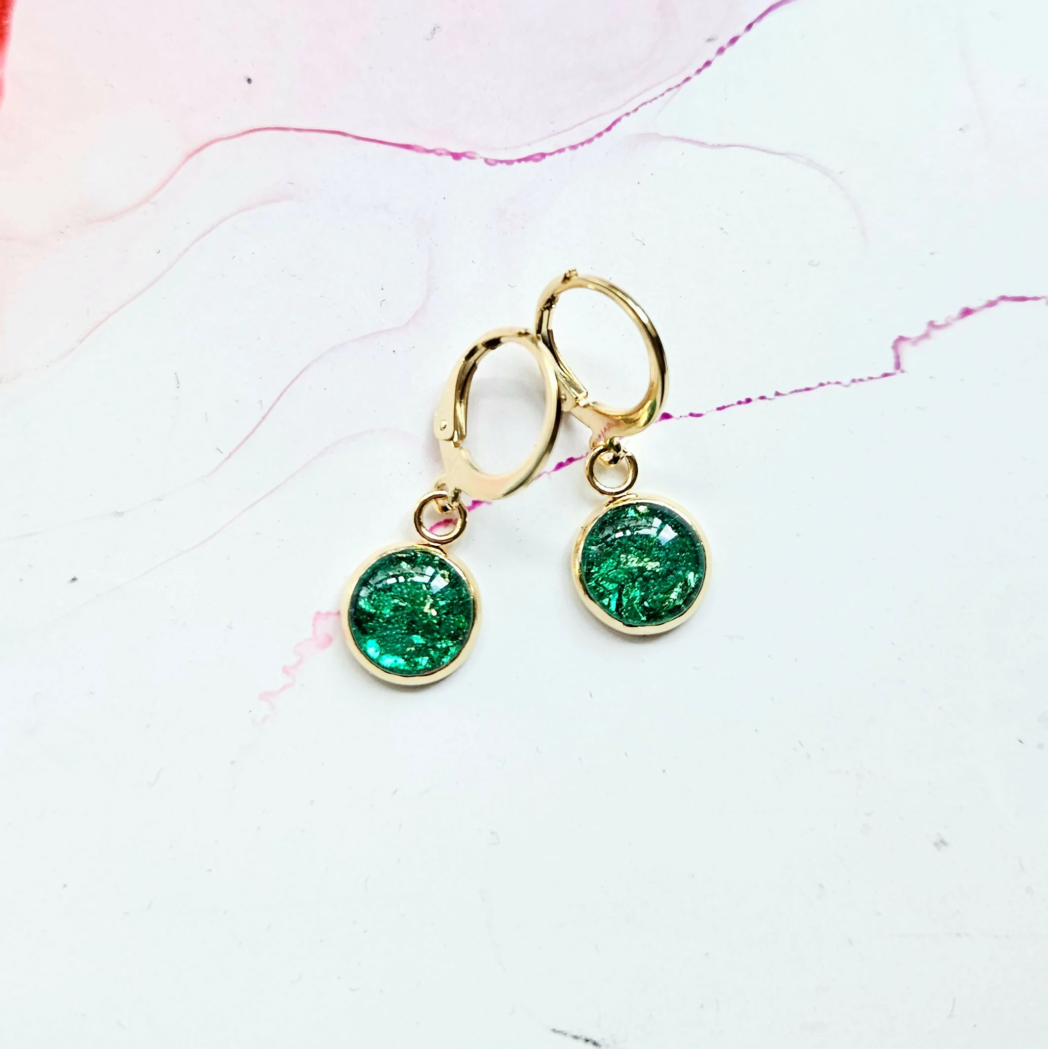 Handmade Purple Or Emerald And Gold Leaf Resin Charms On Golden Huggie Hoops - Image 2