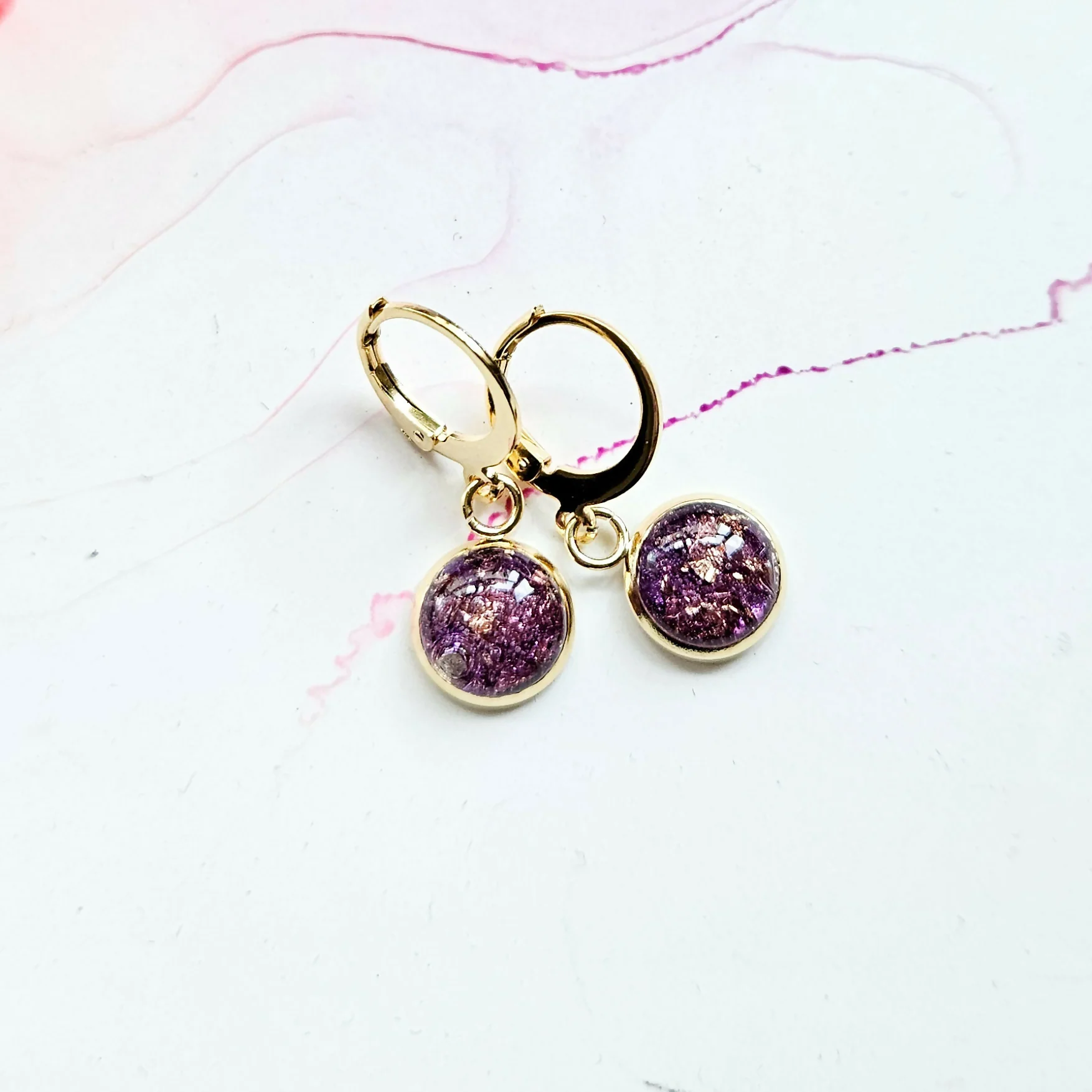 Handmade Purple Or Emerald And Gold Leaf Resin Charms On Golden Huggie Hoops - Image 3