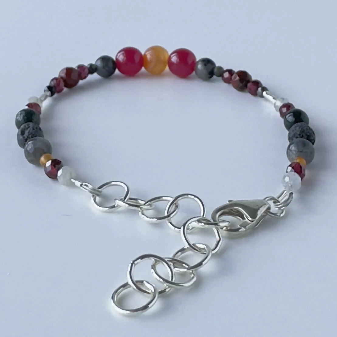 HEALING CRYSTAL & STERLING SILVER ROOT CHAKRA BRACELET WITH AROMATHERAPY BEADS - Image 3