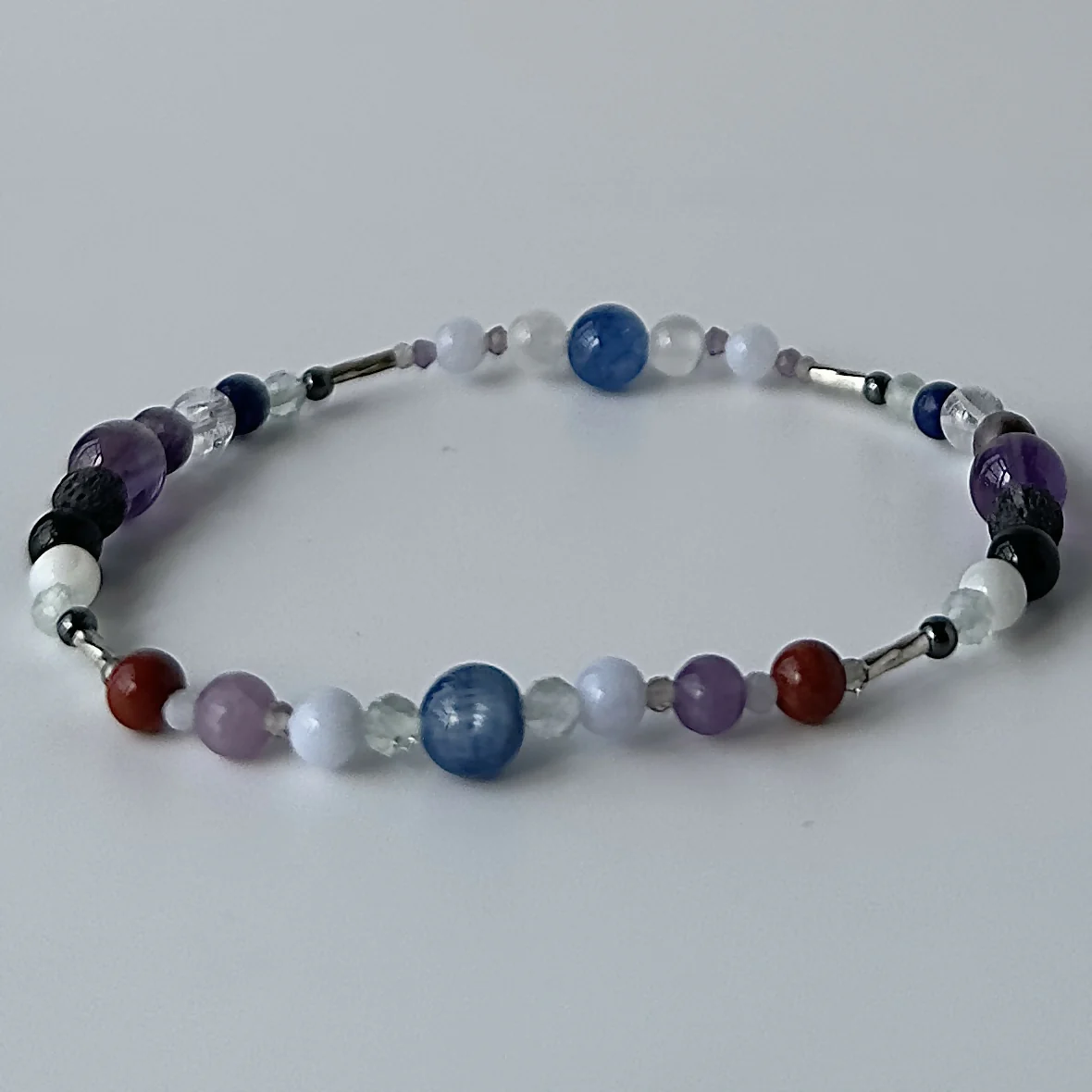 HEALING CRYSTAL & STERLING SILVER STRETCH BRACELET WITH AROMATHERAPY BEADS TO HELP WITH STRESS