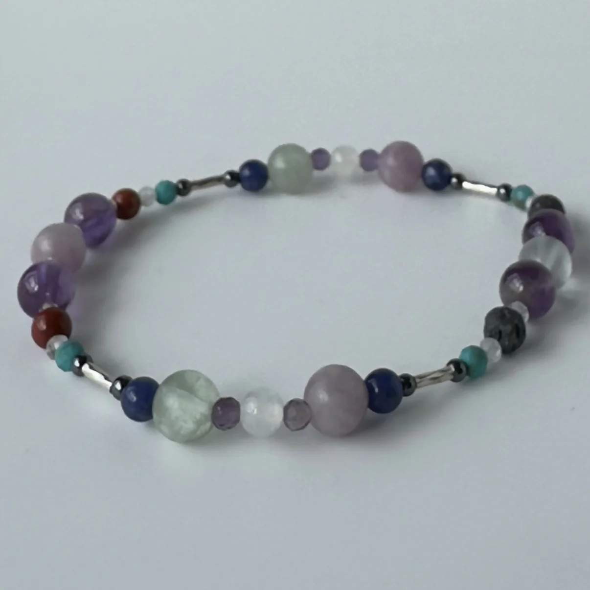 HEALING CRYSTAL & STERLING SILVER STRETCH BRACELET WITH AROMATHERAPY BEADS TO HELP WITH WILLPOWER & DETERMINATION