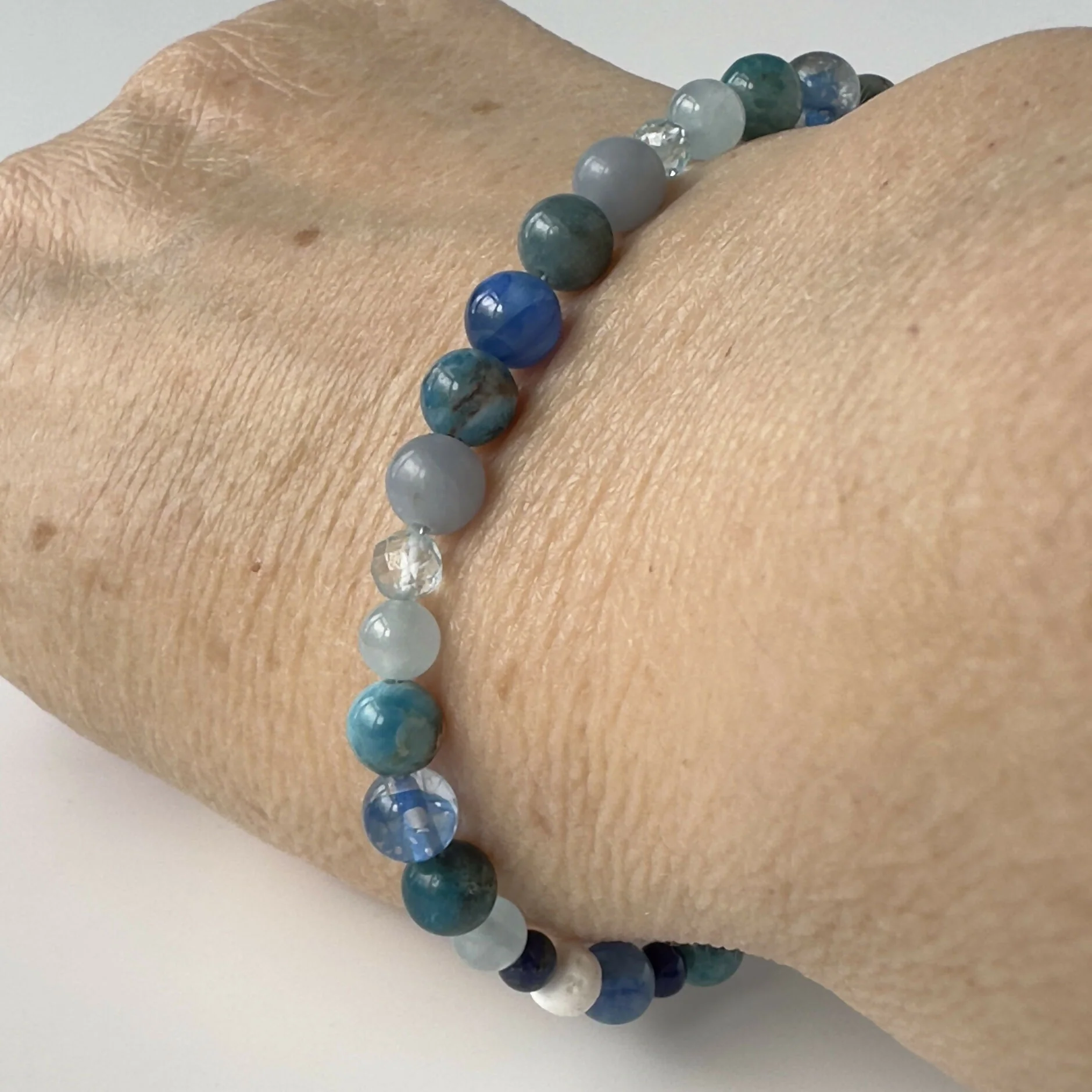 HEALING CRYSTAL & STERLING SILVER THROAT CHAKRA BRACELET WITH AROMATHERAPY BEADS - Image 4