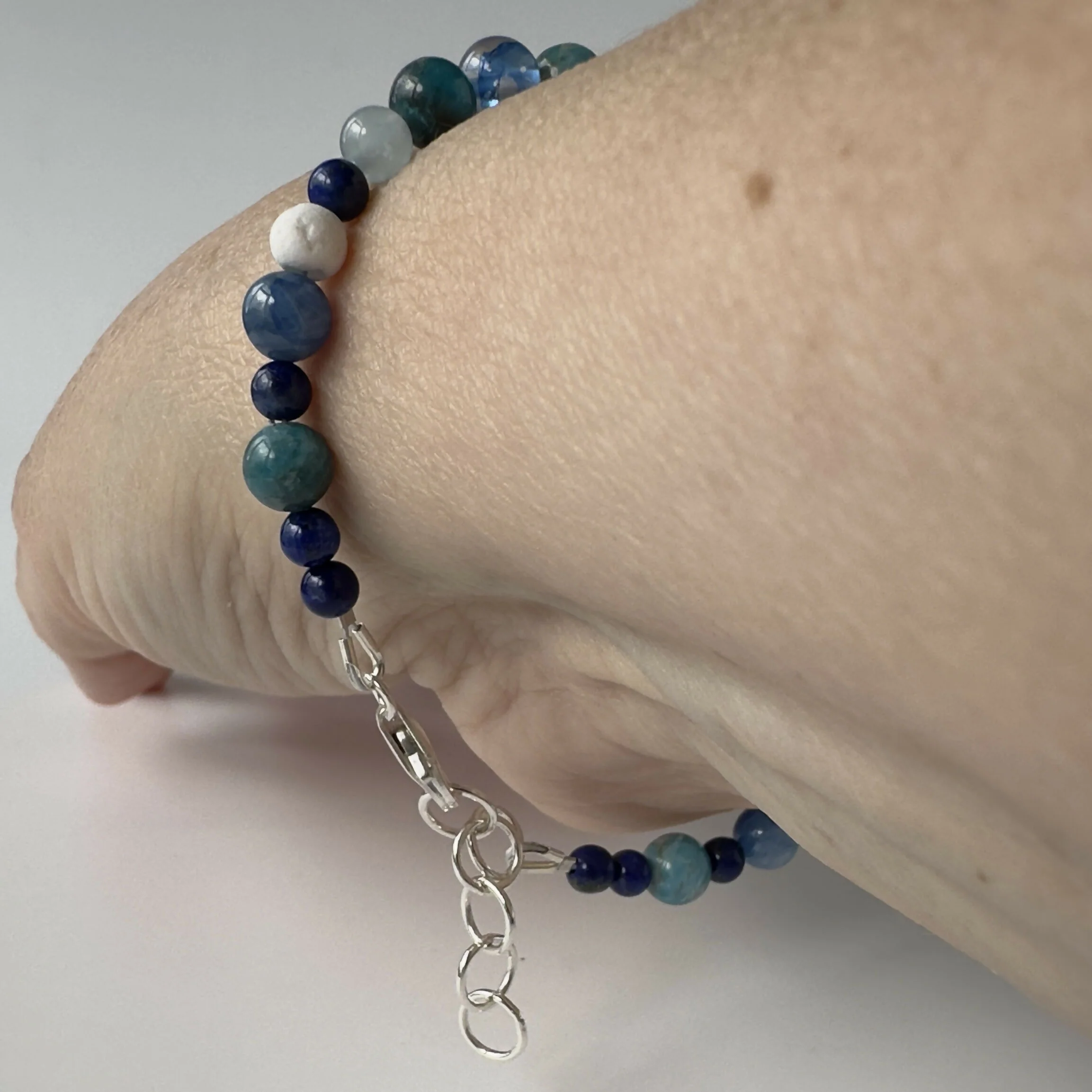 HEALING CRYSTAL & STERLING SILVER THROAT CHAKRA BRACELET WITH AROMATHERAPY BEADS - Image 6