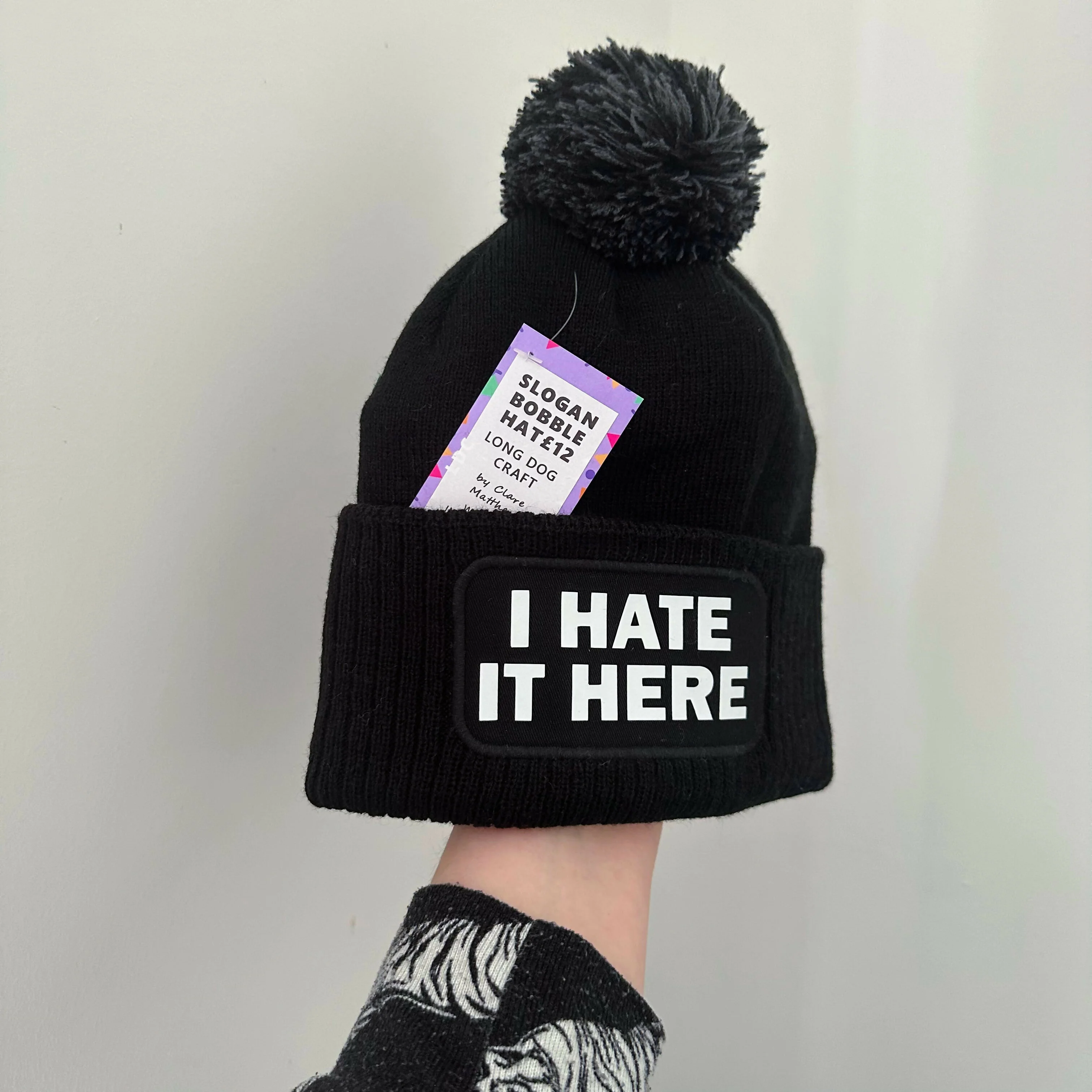 I Hate It Here Cuffed Rectangular Patch Bobble Hat - Image 3