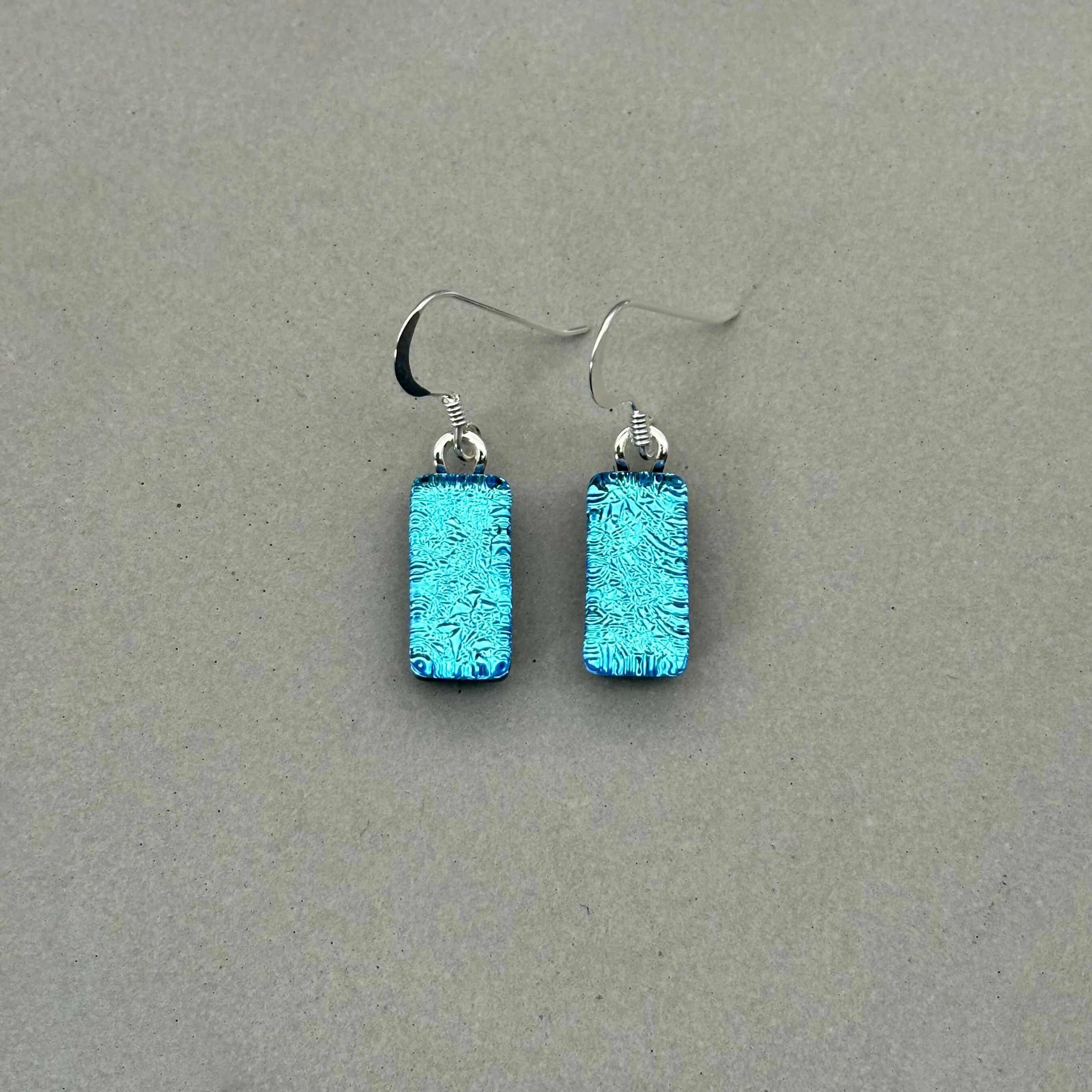 Ice Blue Dichroic Fused Glass Dangle Sterling Silver Earrings - Handmade by Jade Tapson Glass.