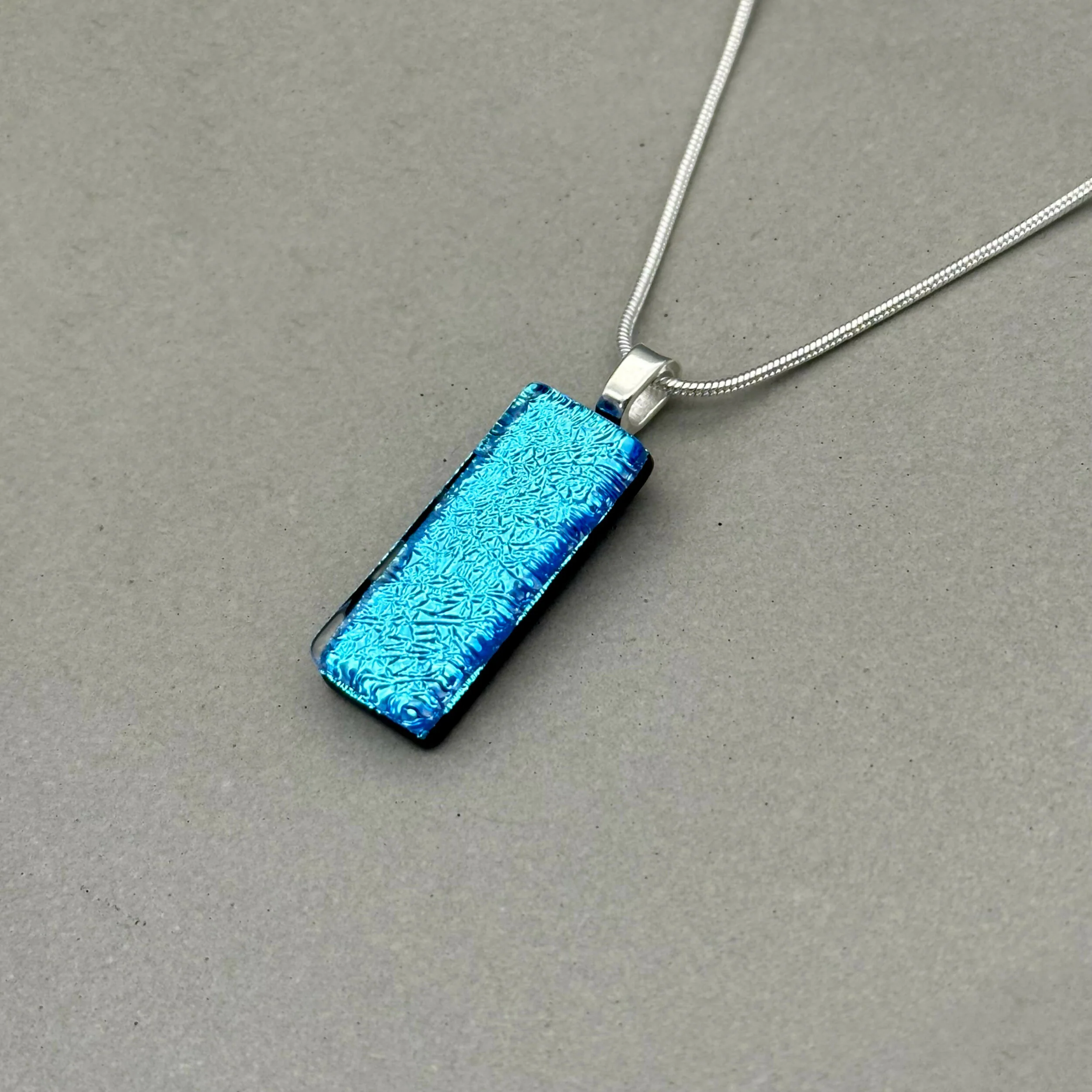 Ice Blue Dichroic Fused Glass Pendant with Silver Plated Chain - Handmade by Jade Tapson Glass. - Image 3