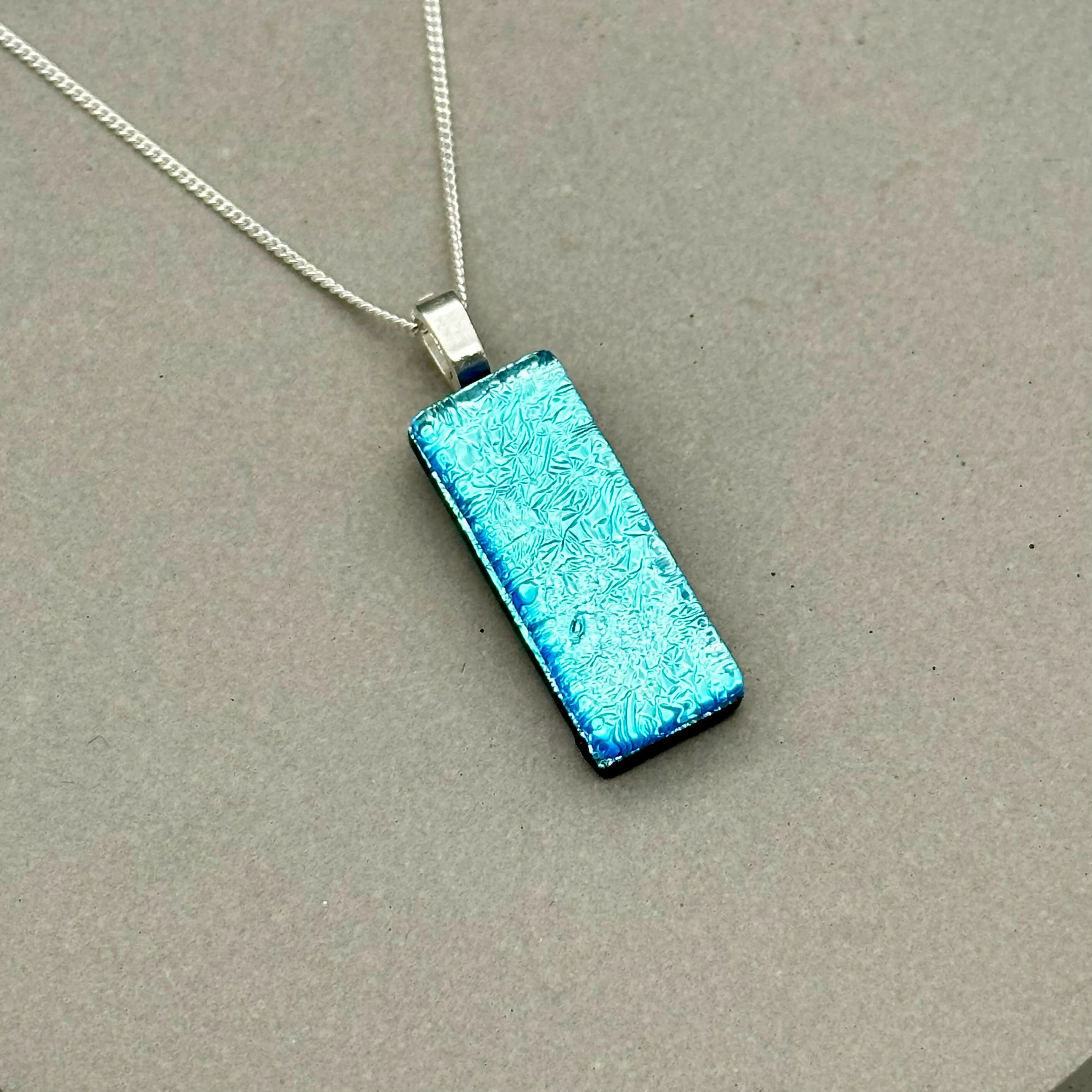 Ice Blue Dichroic Fused Glass Pendant with Silver Plated Chain - Handmade by Jade Tapson Glass. - Image 4