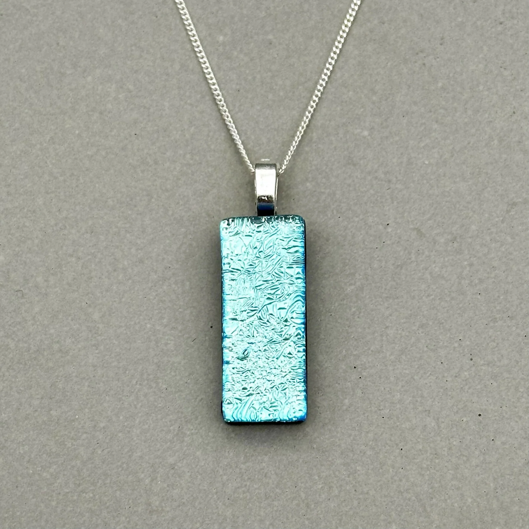 Ice Blue Dichroic Fused Glass Pendant with Silver Plated Chain - Handmade by Jade Tapson Glass. - Image 5