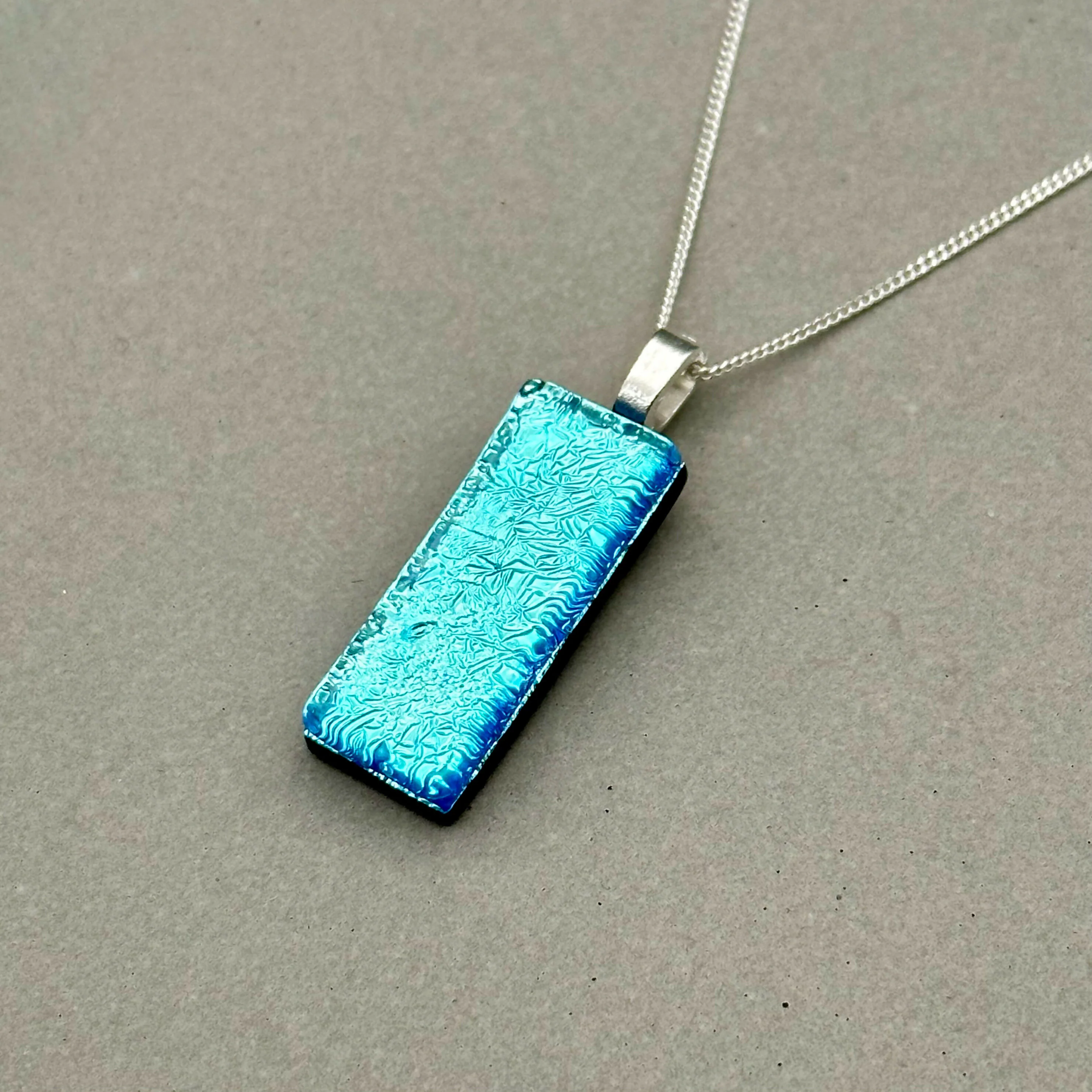 Ice Blue Dichroic Fused Glass Pendant with Silver Plated Chain - Handmade by Jade Tapson Glass. - Image 6