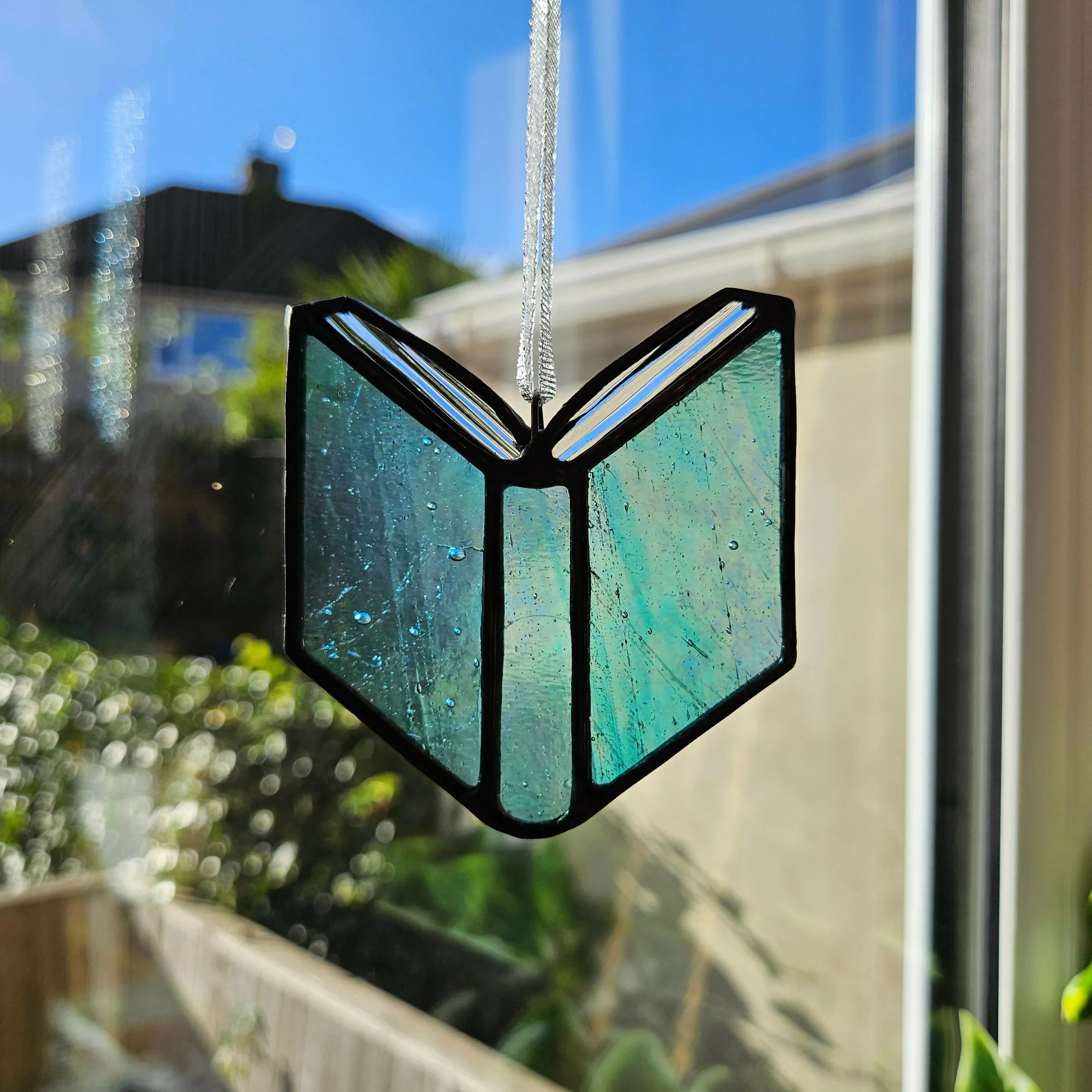 Iridescent Blue Book Stained Glass Suncatcher - Image 4