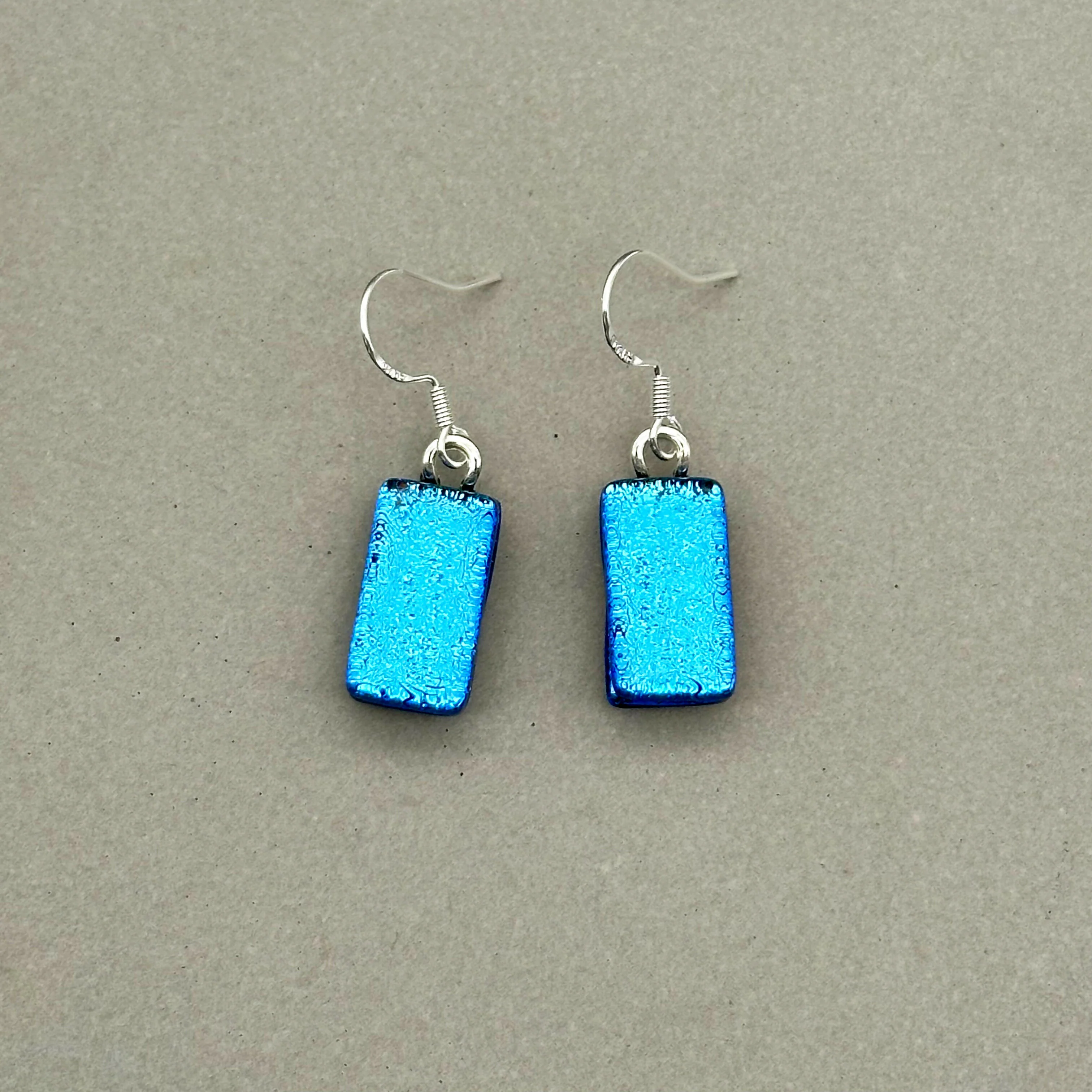 Light Blue Dichroic Fused Glass Dangle Sterling Silver Earrings - Handmade by Jade Tapson Glass.