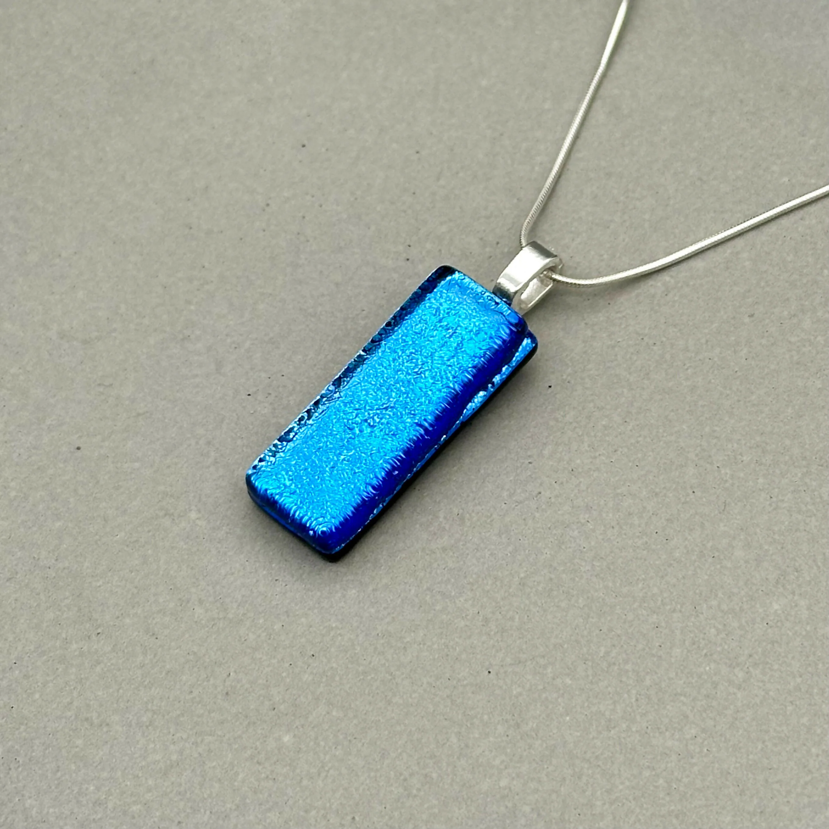 Light Blue Dichroic Fused Glass Pendant with Silver Plated Chain - Handmade by Jade Tapson Glass. - Image 3