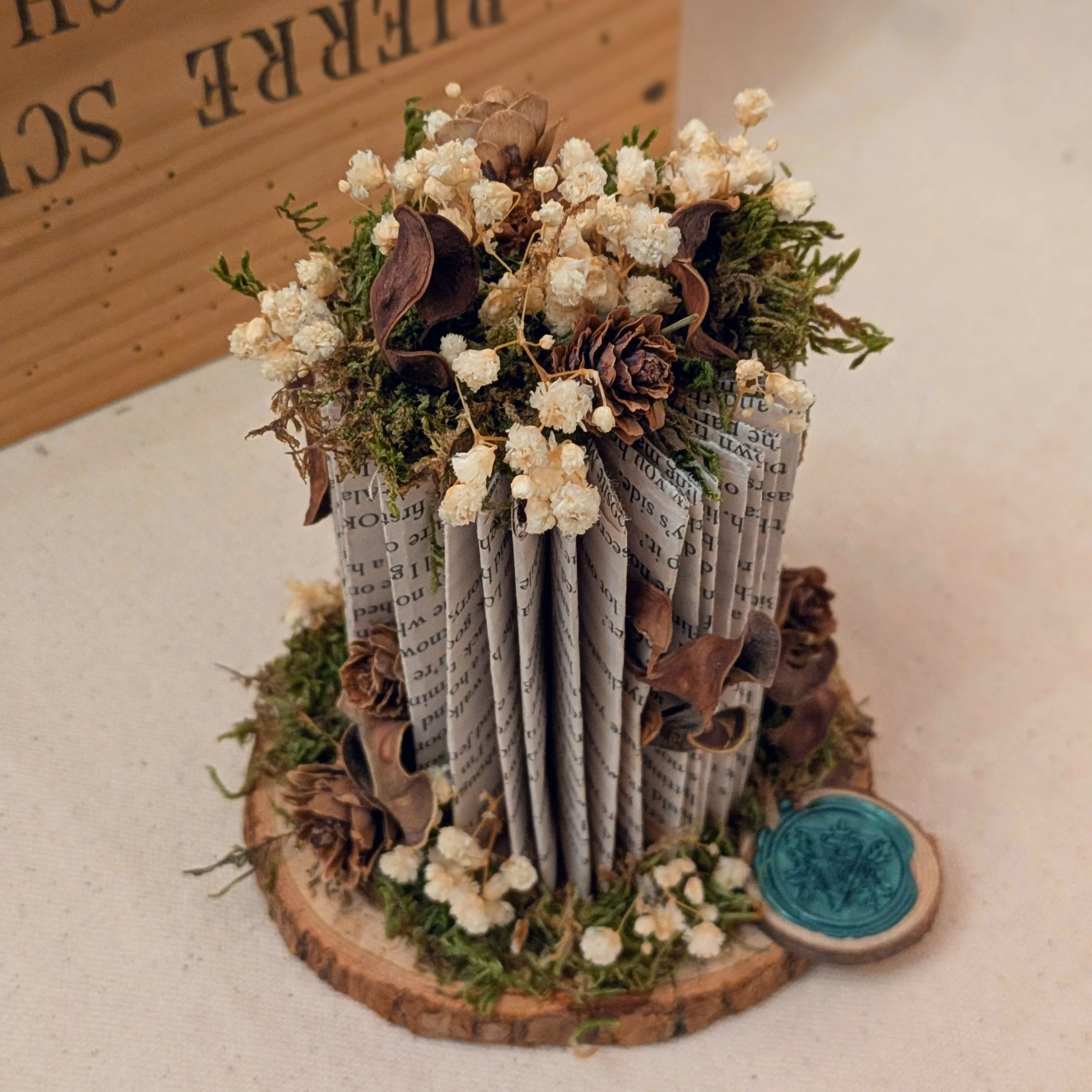 Miniature Brown Floral Arrangement on Wooden Slice