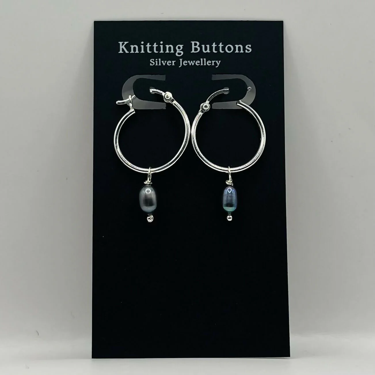 Pearl Huggie Earrings - Image 8