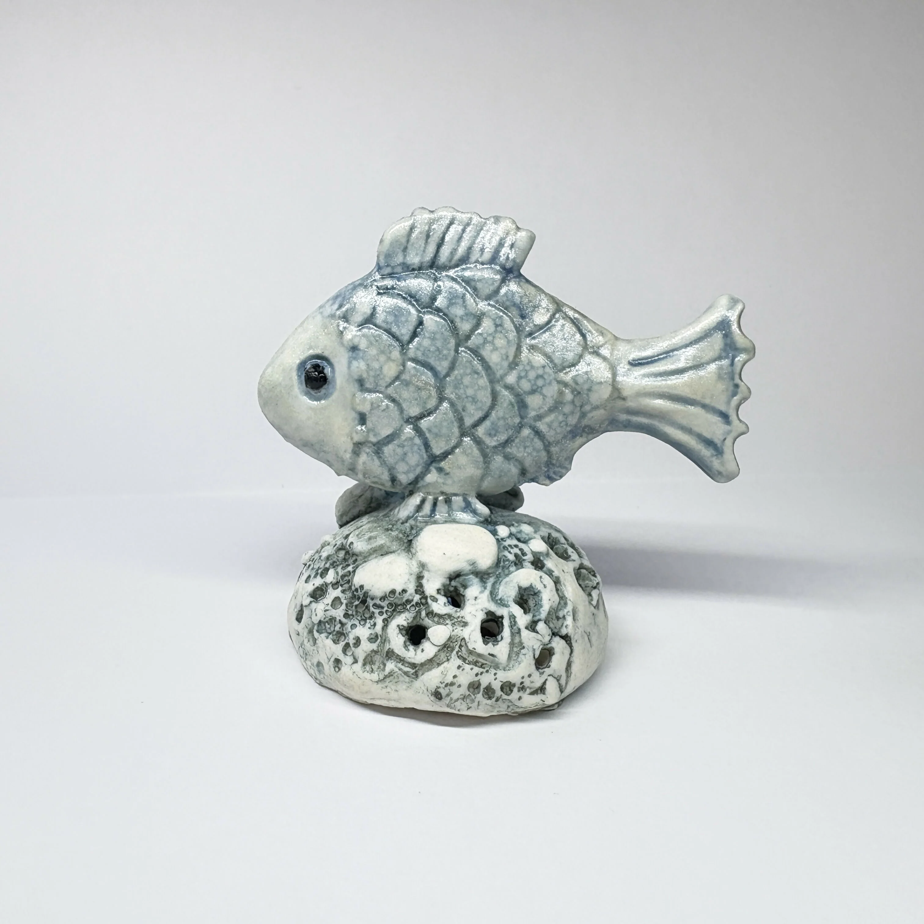 Porcelain Fish on Rock