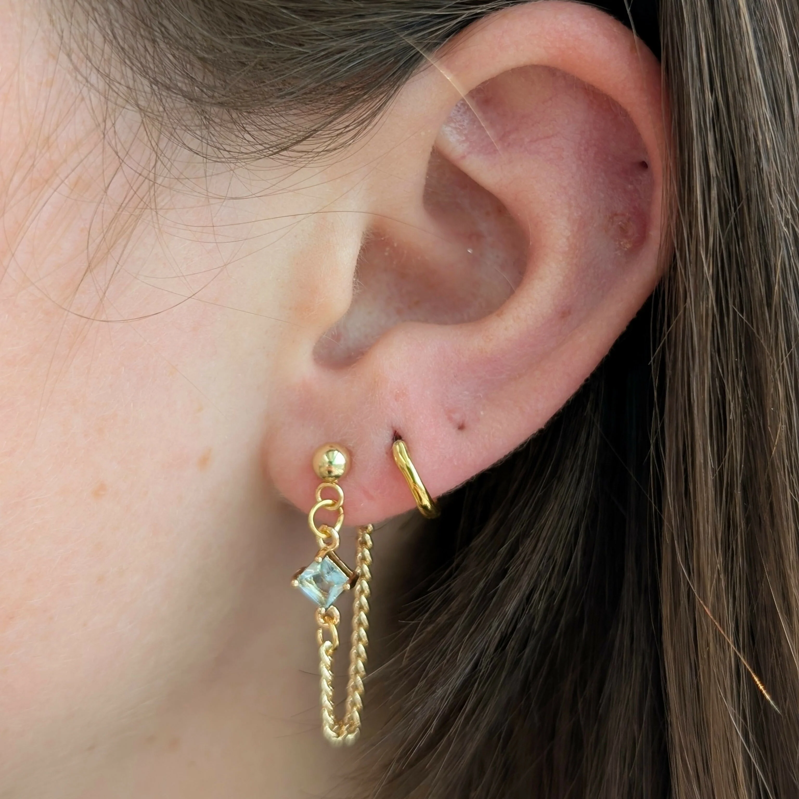 Powder Blue Zirconia Chain Earrrings on Gold Plated Ball Stud