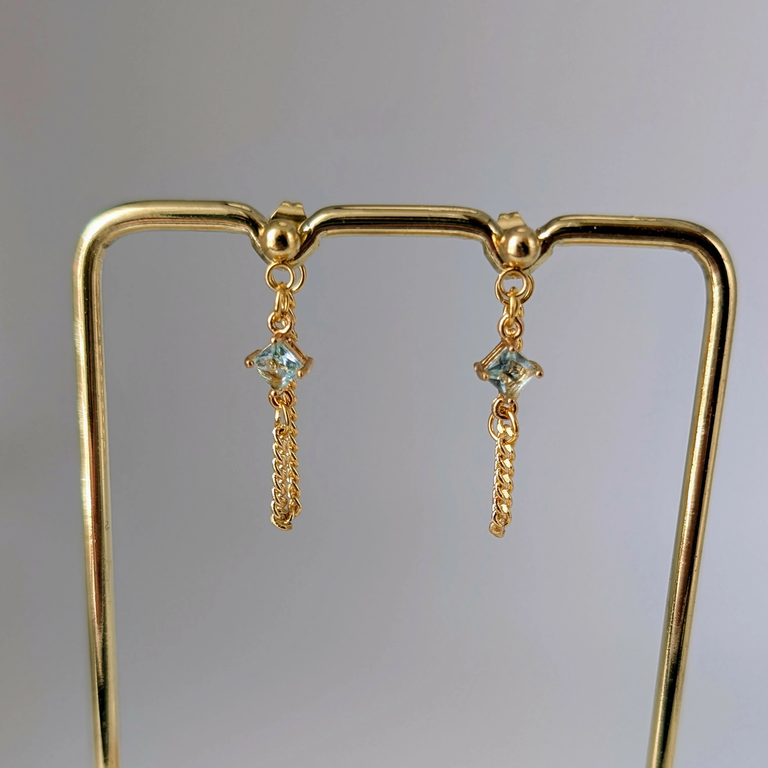 Powder Blue Zirconia Chain Earrrings on Gold Plated Ball Stud - Image 4