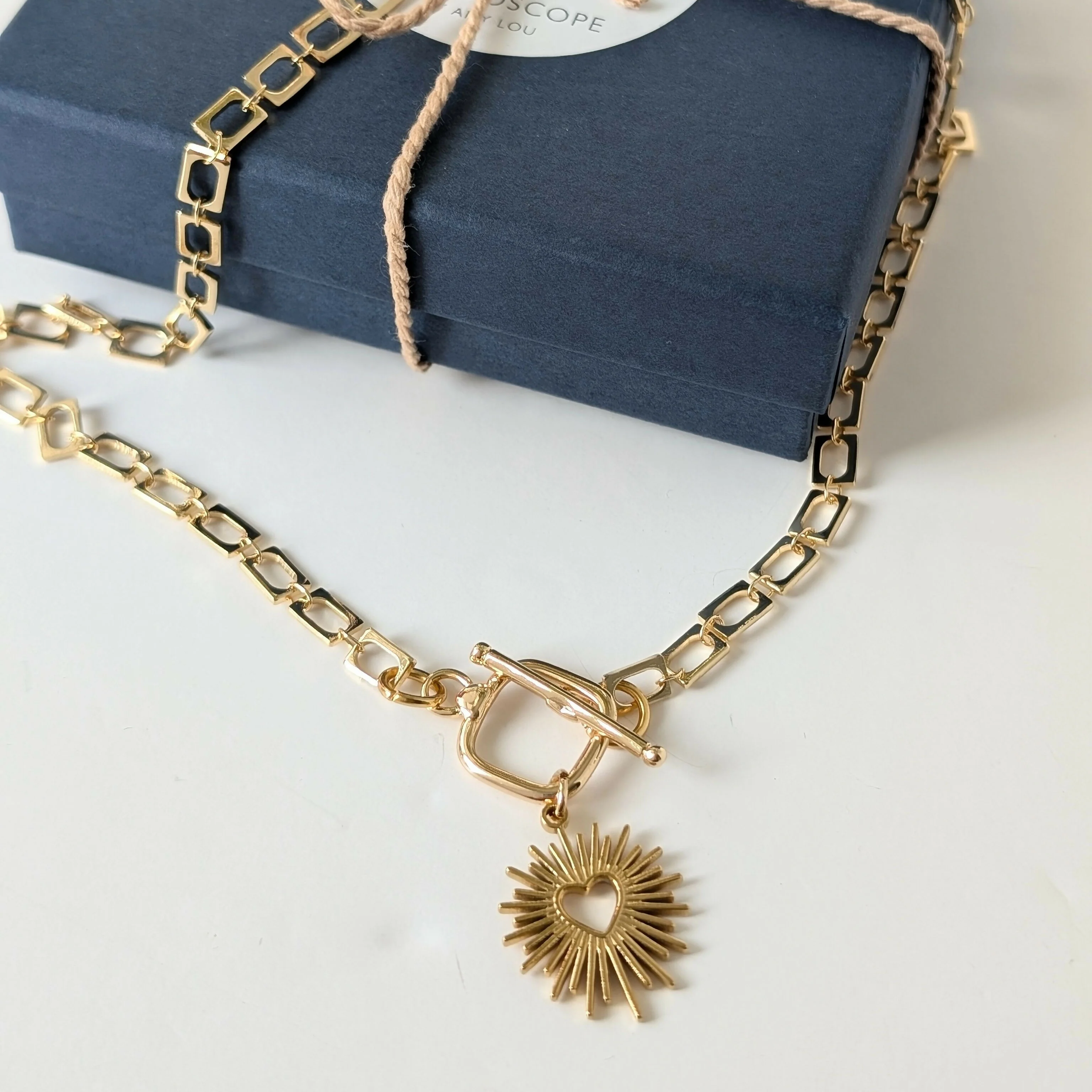 Sacred Heart Gold Toggle Necklace on Rectangular Gold Plated Chain - Image 3