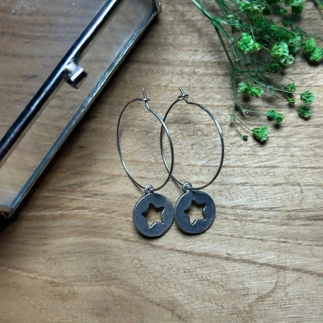 Silver Plated Hoops Featuring Cutout Star Charm