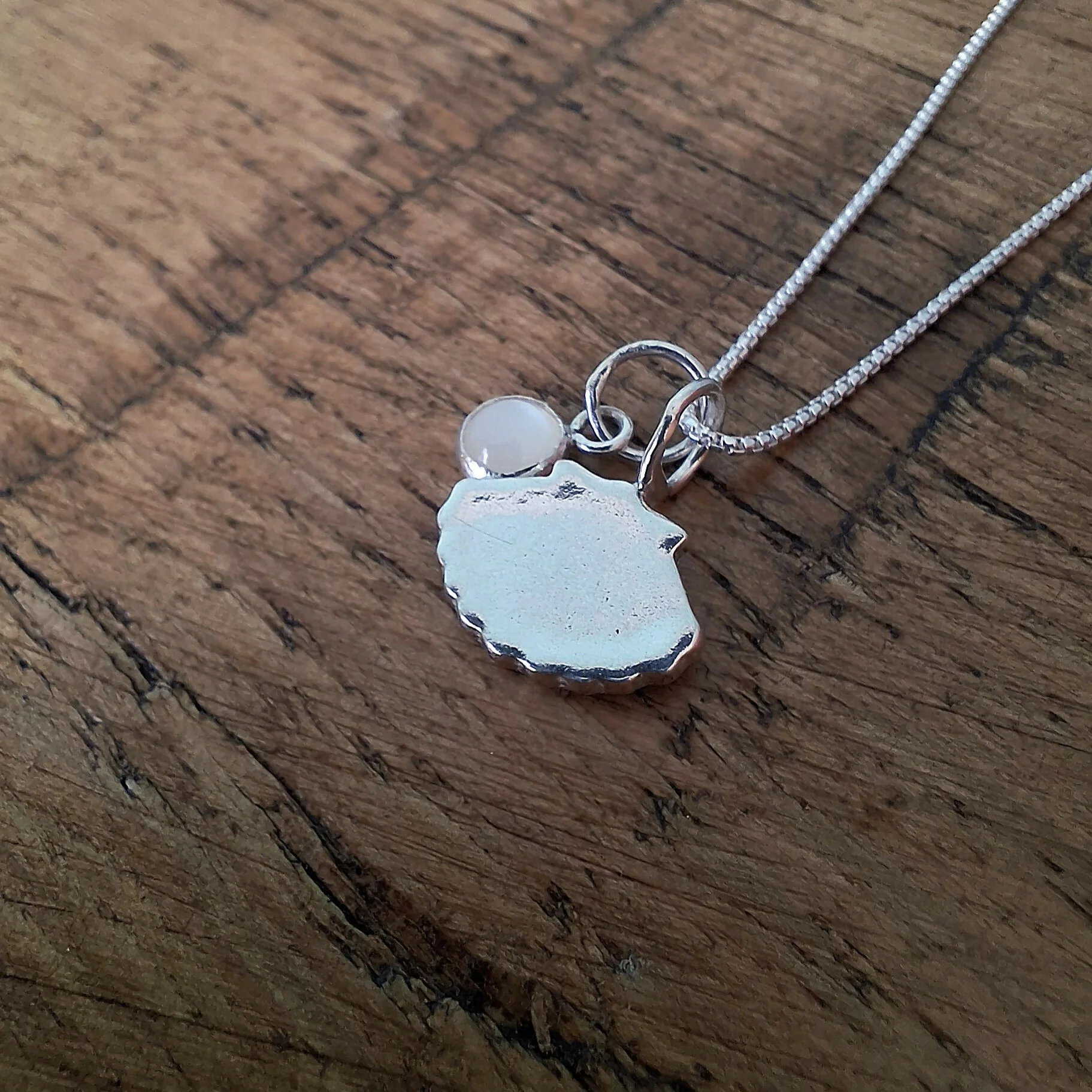 Small Handmade Silver Shell Charm With Mother Of Pearl - Image 2