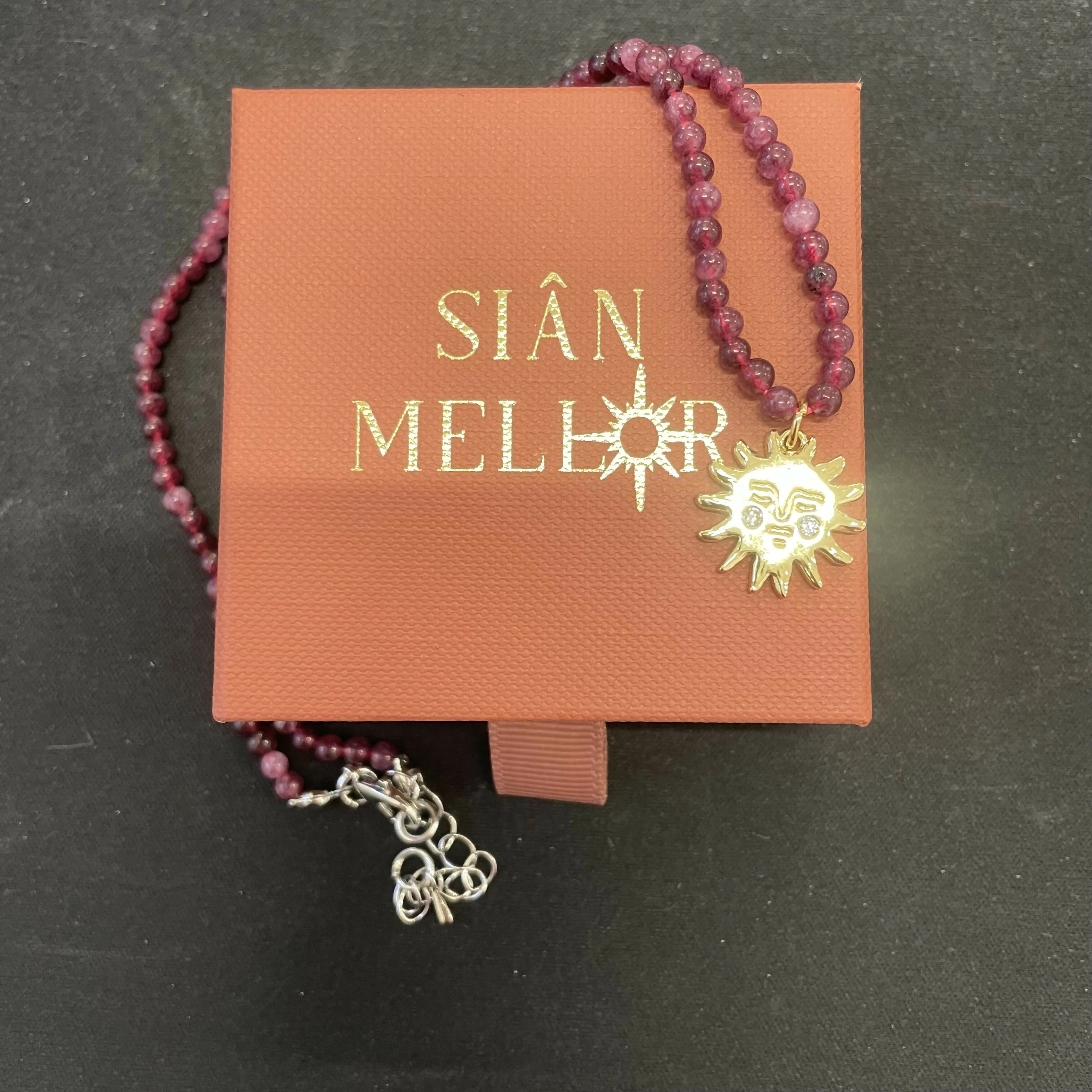 Sun Pendant on Beads