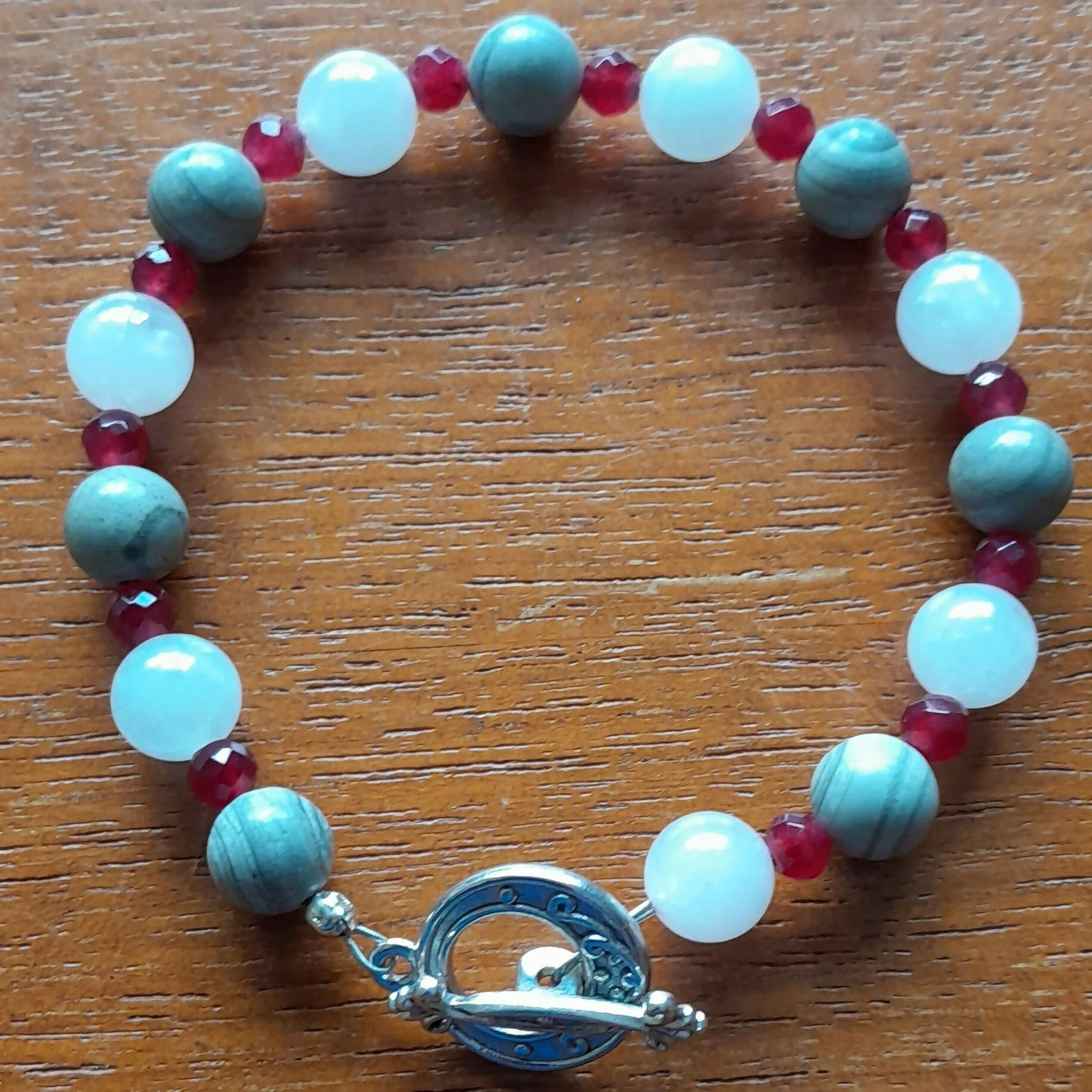 Tibetan Silver Toggle Catch Bracelet with Grey Landscape Jasper, Faceted Red Chalcedony and Rose Quartz.