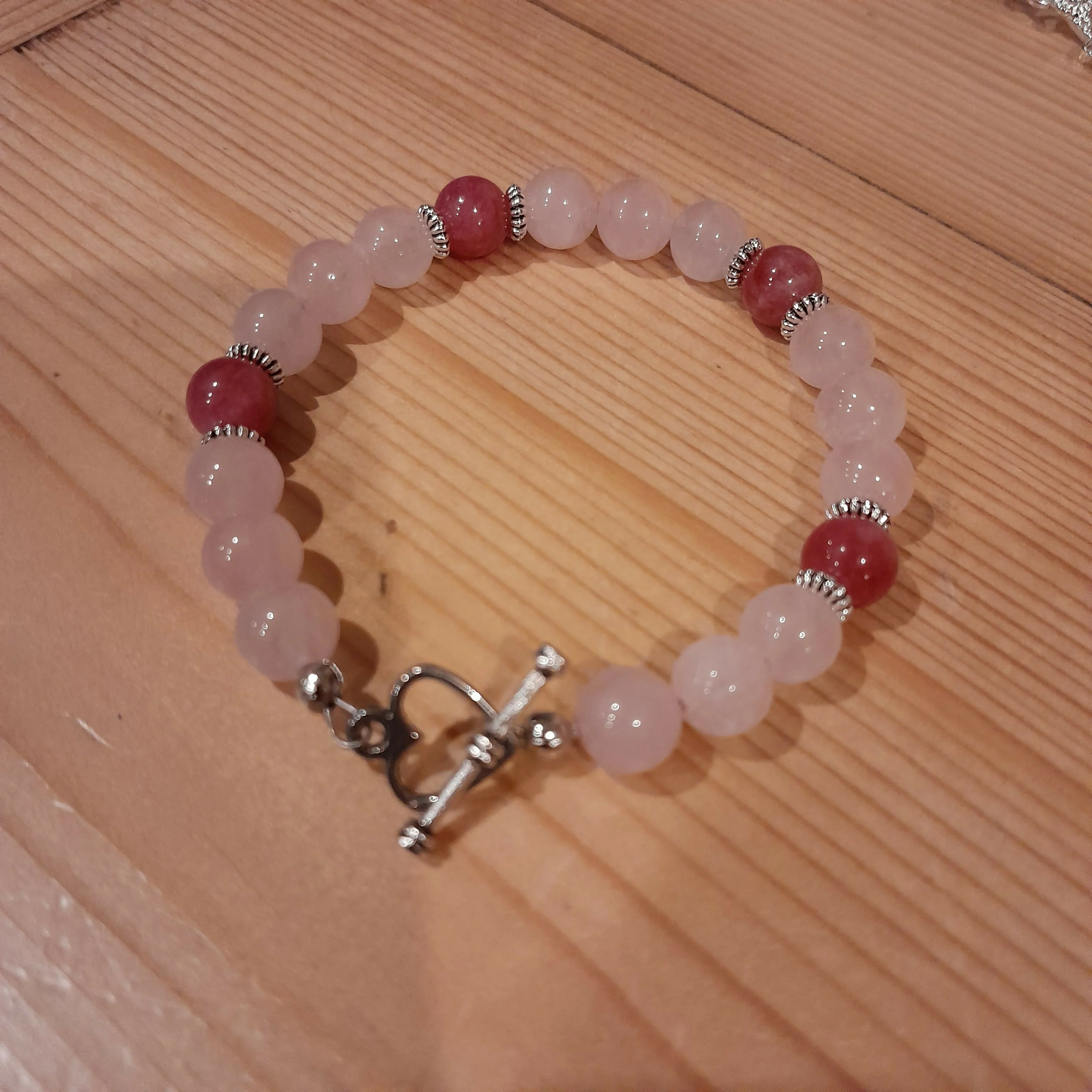 Tibetan silver Toggle Catch Bracelet with Rose Quartz, Tibetan silver spacer Beads and Strawberry Quartz.