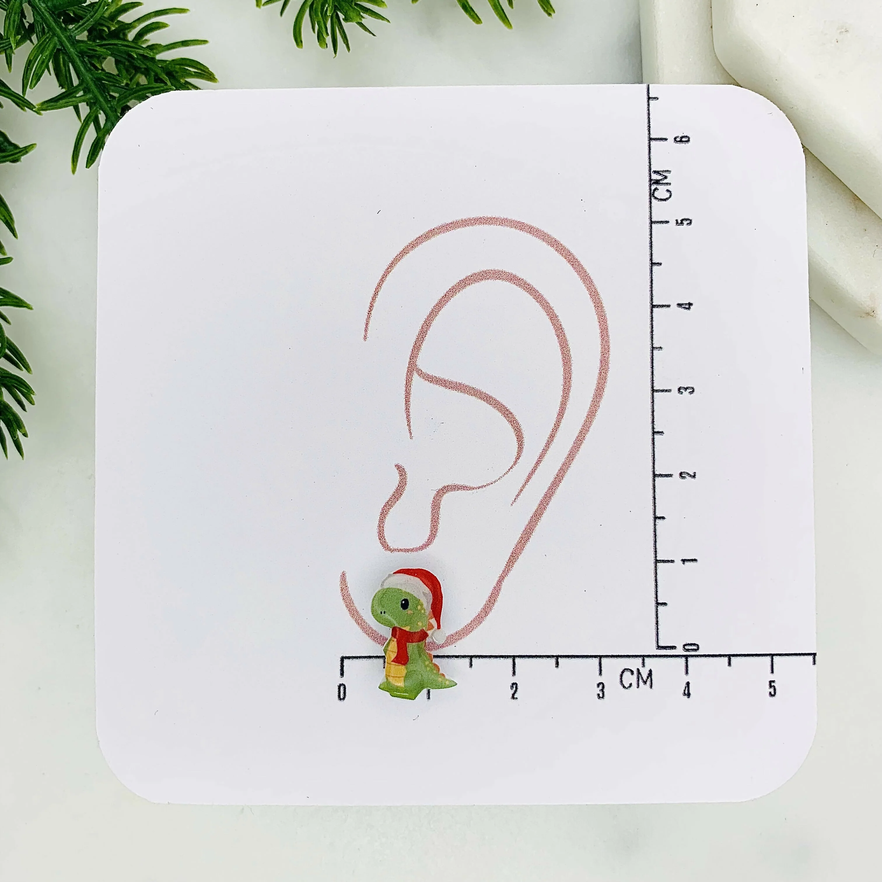 Winter T-rex Dinosaur Stud Earrings - Image 3